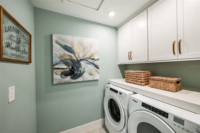 a bedroom with a bed and a table