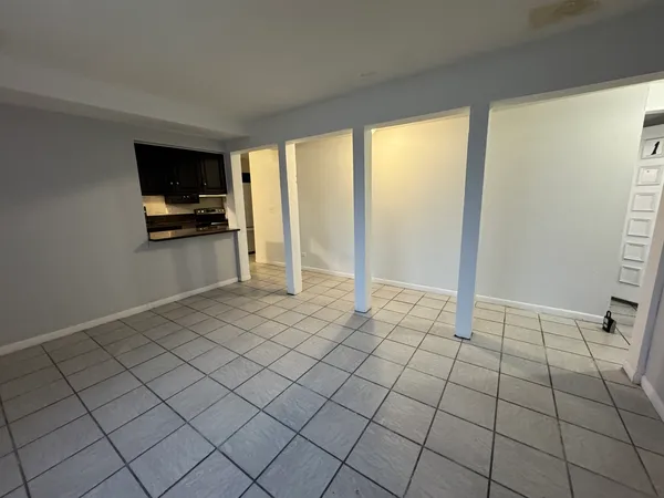 a view of an empty room and window