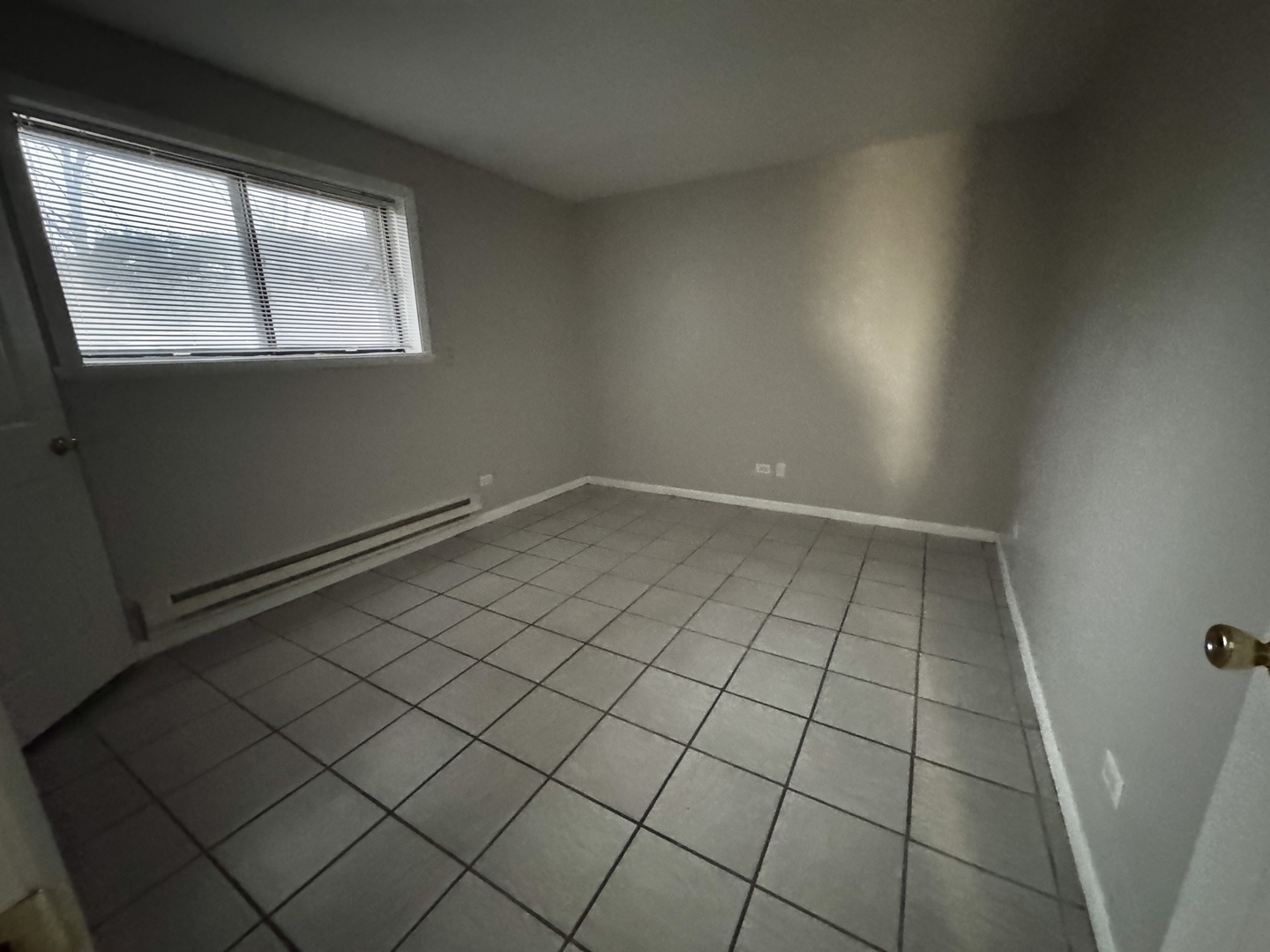 1751 Felten Road, Unit 1 Aurora, IL 60505 - Photo 10 of 11 an empty room with windows