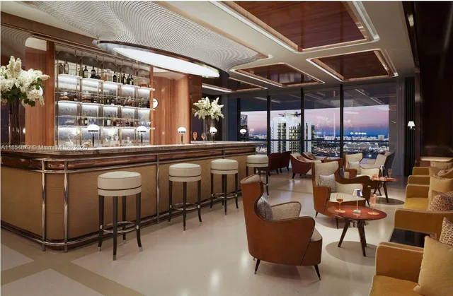 a living room with furniture and floor to ceiling windows