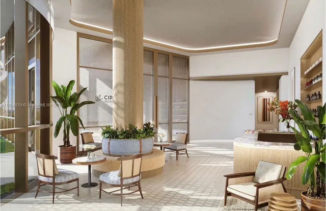 a kitchen with stainless steel appliances kitchen island granite countertop a refrigerator and a stove top oven