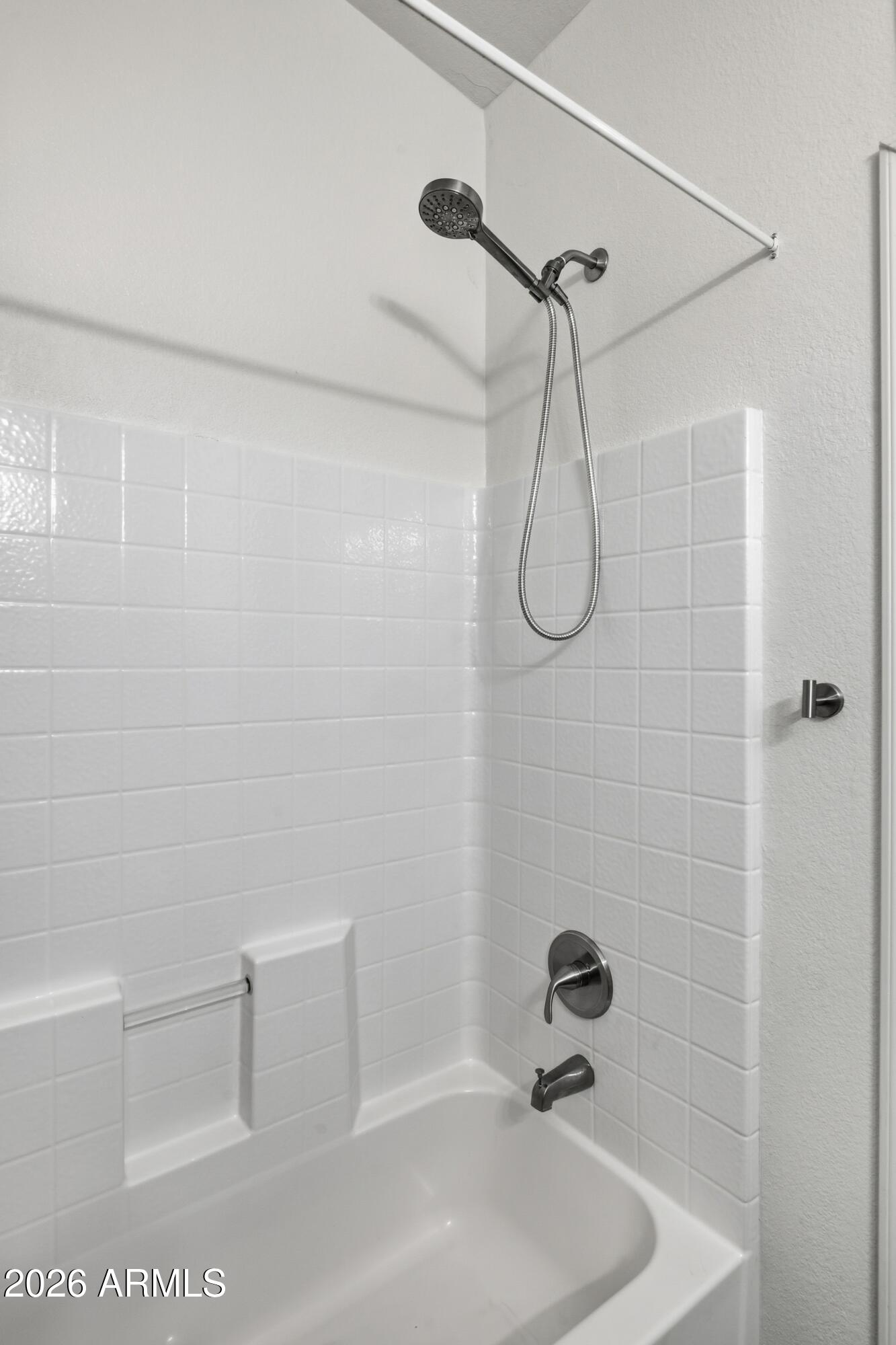 206 East Pine Street Payson, AZ 85541 - Photo 18 of 30 a bathroom with a shower and a white bath tub