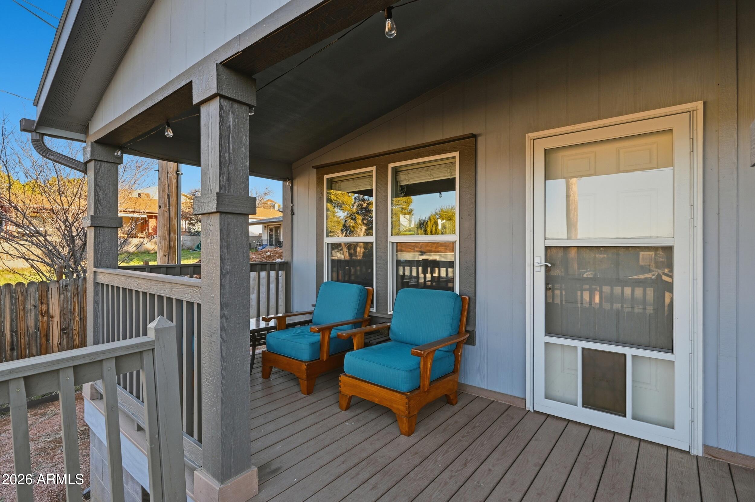 206 East Pine Street Payson, AZ 85541 - Photo 26 of 30 a blue bench sitting in front of a building