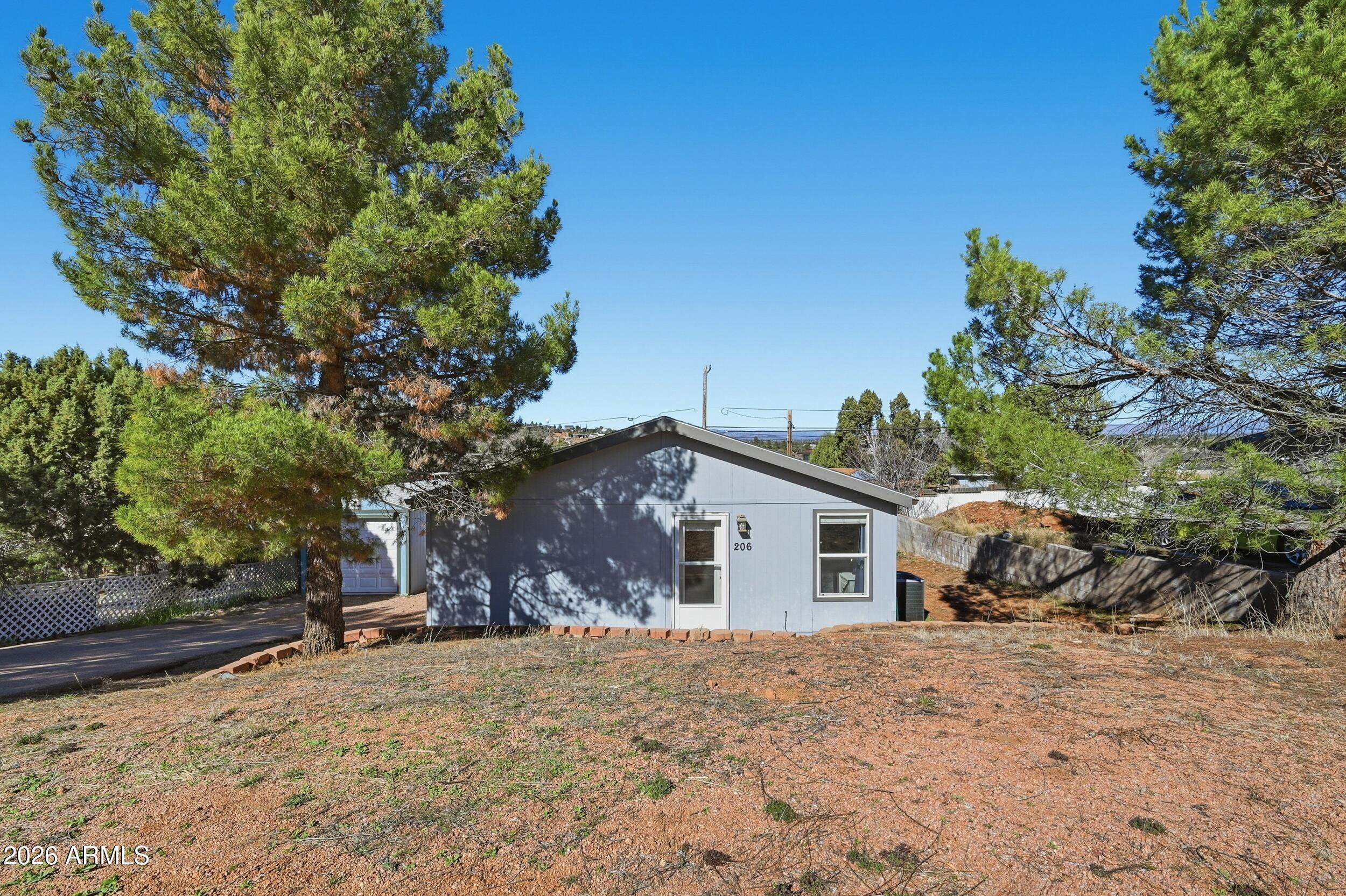 206 East Pine Street Payson, AZ 85541 - Photo 28 of 30 a view of a house with a tree