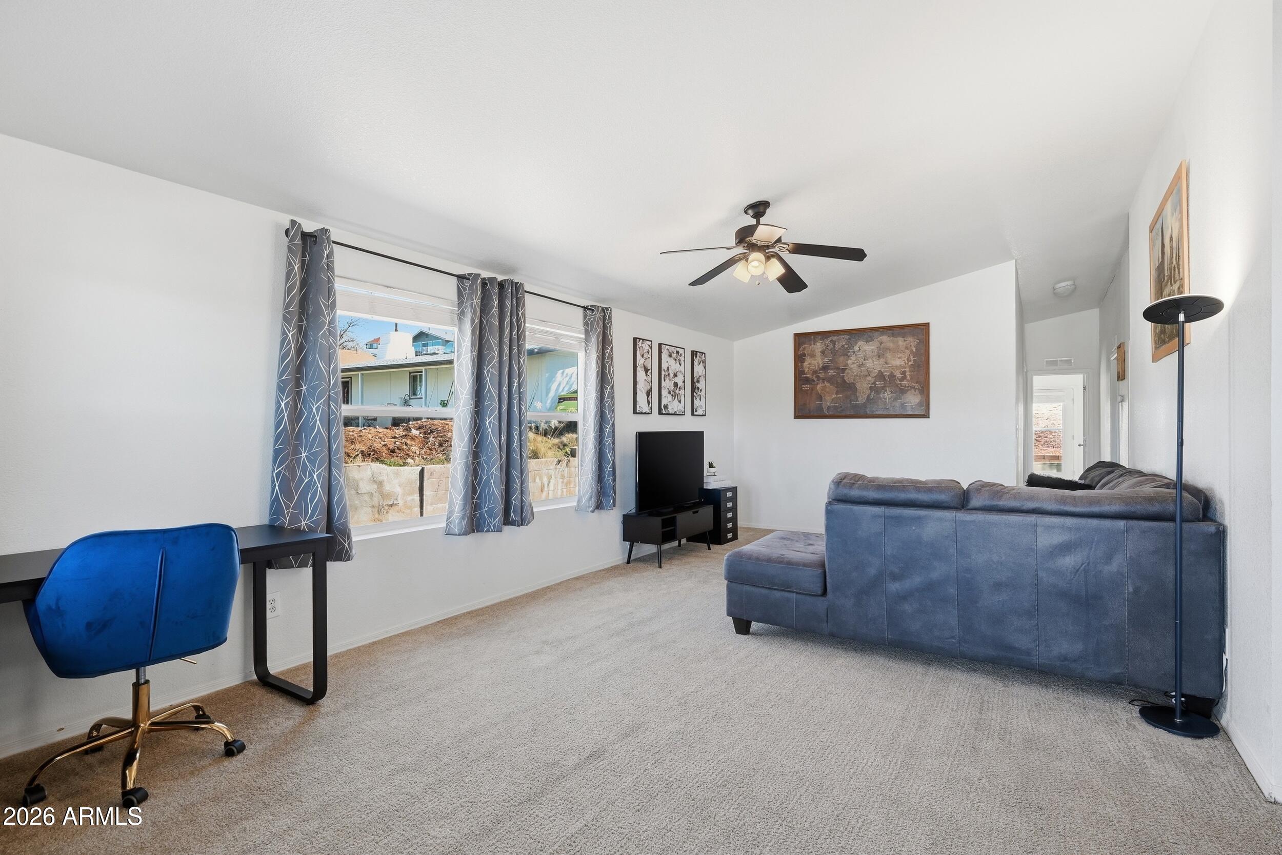 206 East Pine Street Payson, AZ 85541 - Photo 3 of 30 a living room with furniture and a window