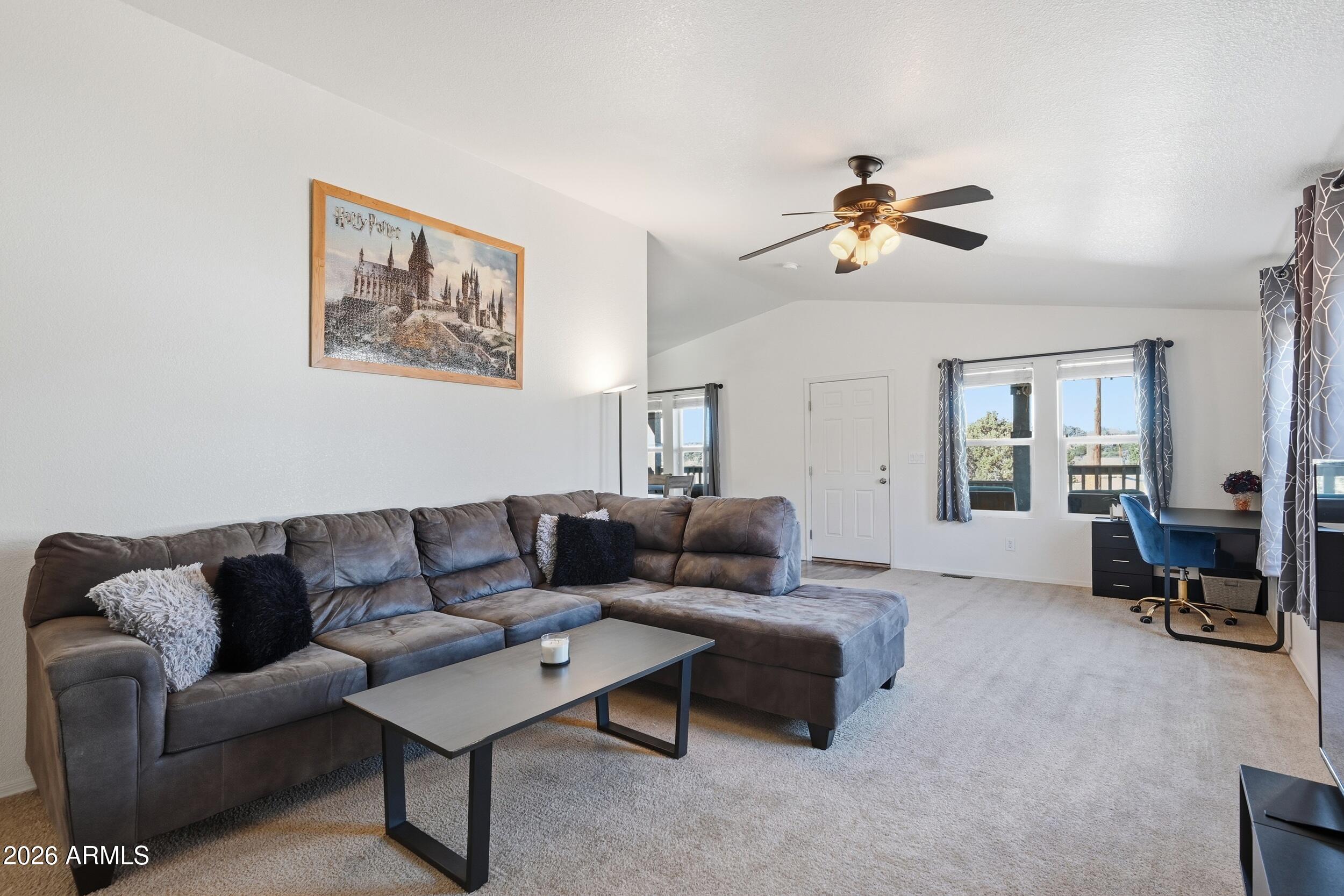 206 East Pine Street Payson, AZ 85541 - Photo 5 of 30 a living room with furniture and a couch