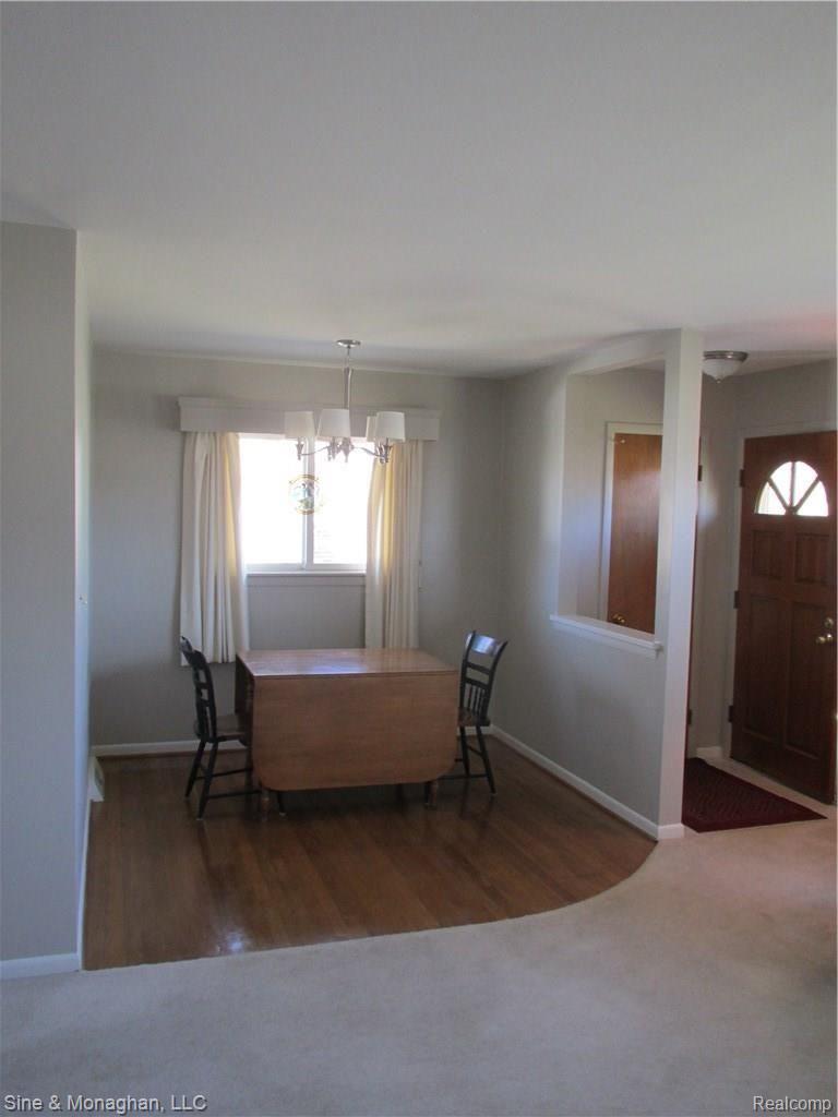 351 West Tienken Road Rochester, MI 48306 - Photo 5 of 24 Dining room with updated chandelier