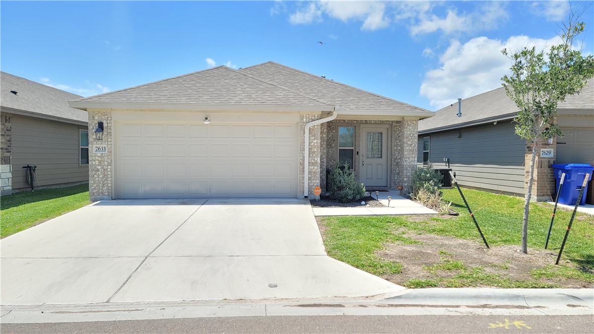 a view of a backyard with a patio