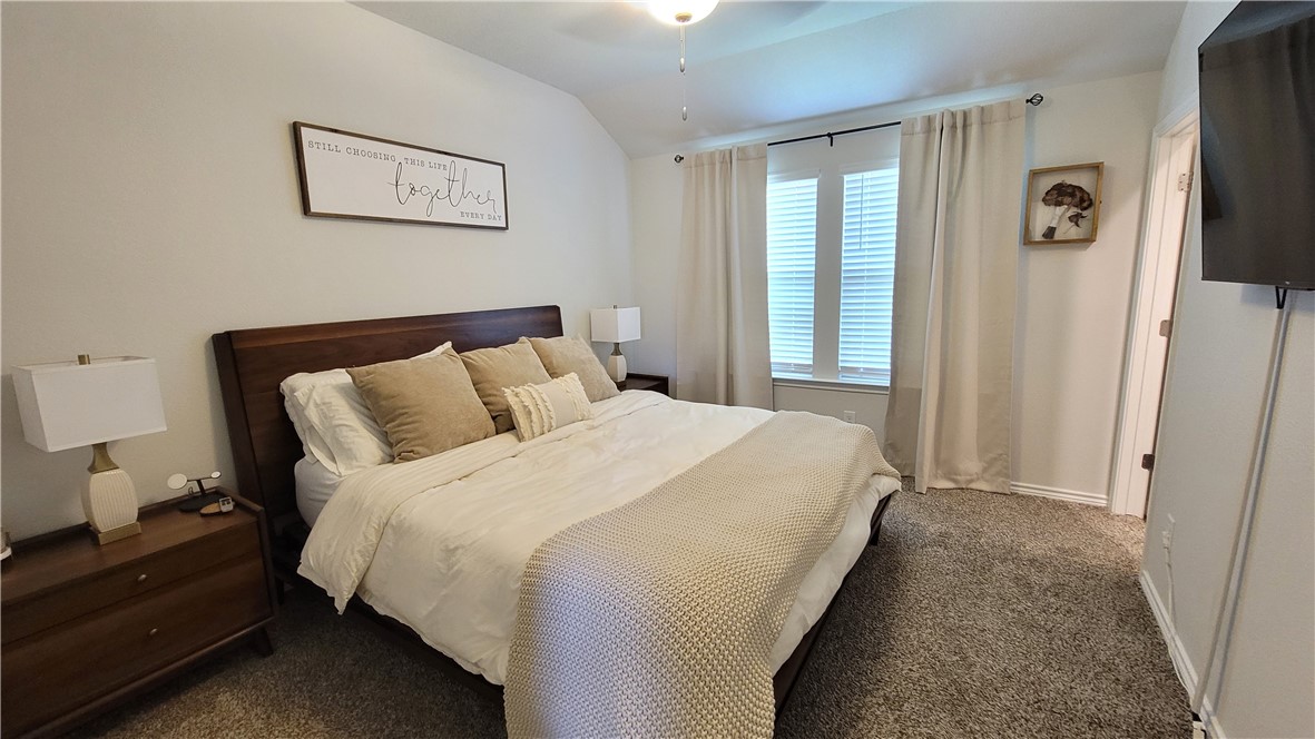 7633 Shadow Rider Lane Corpus Christi, TX 78414 - Photo 13 of 23 a bedroom with bed and a window