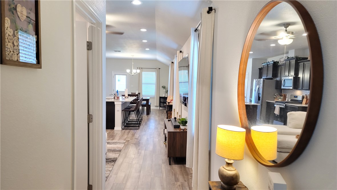 7633 Shadow Rider Lane Corpus Christi, TX 78414 - Photo 3 of 23 a view of a living room and bathroom