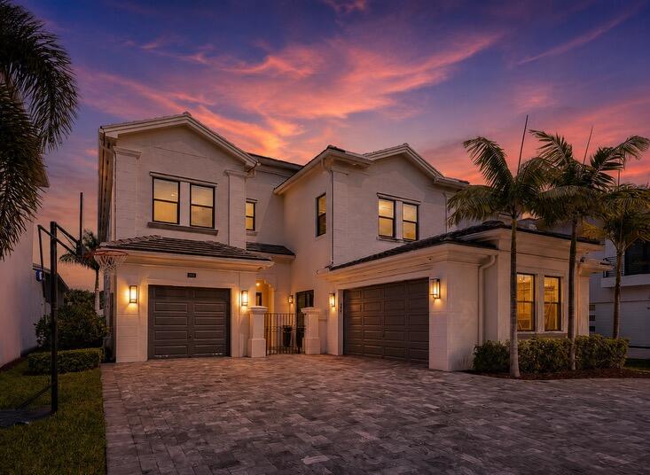 9065 Benedetta Place Boca Raton, FL 33496 - Photo 2 of 52 a front view of a house with a yard