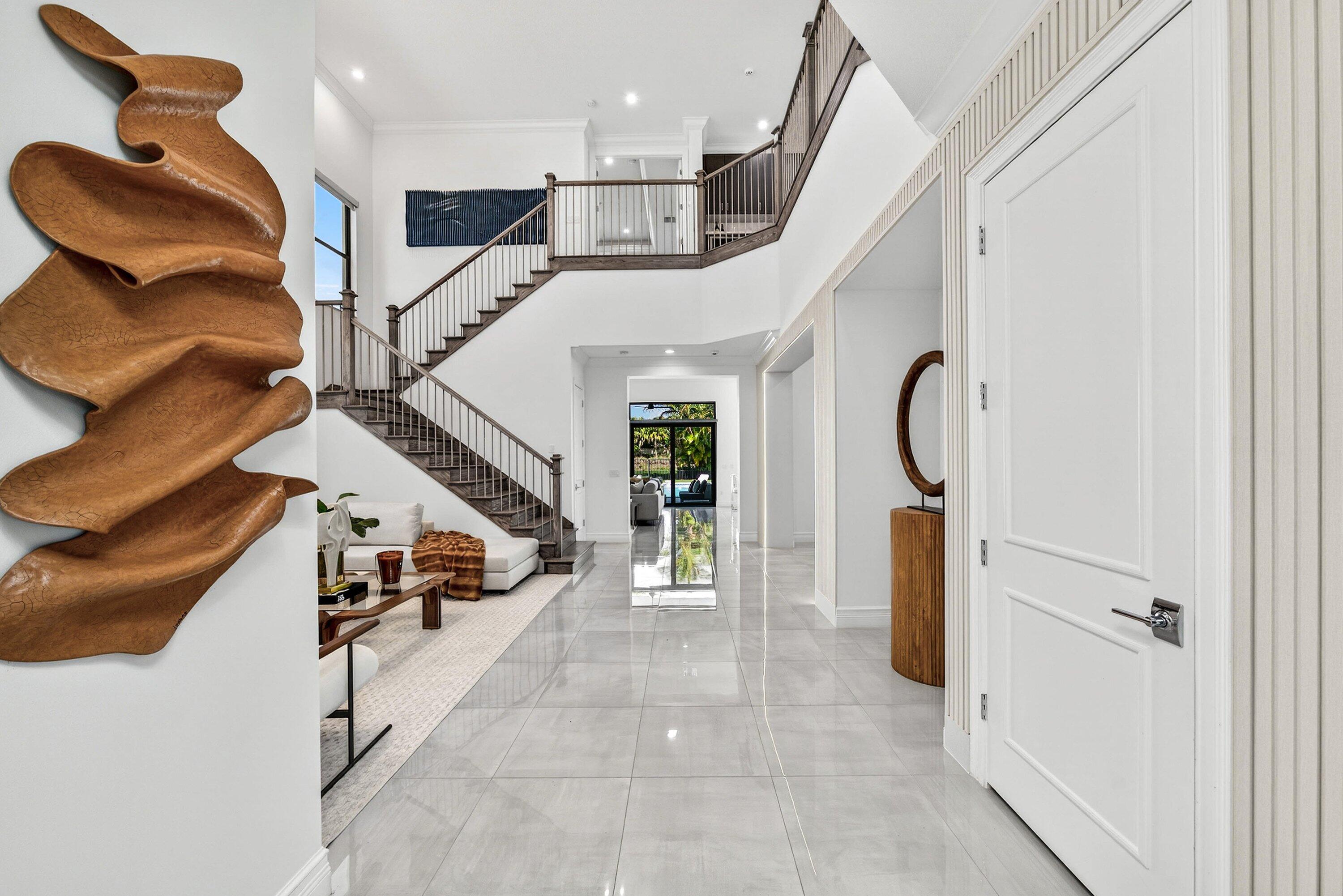 9065 Benedetta Place Boca Raton, FL 33496 - Photo 2 of 51 a view of entryway and hall