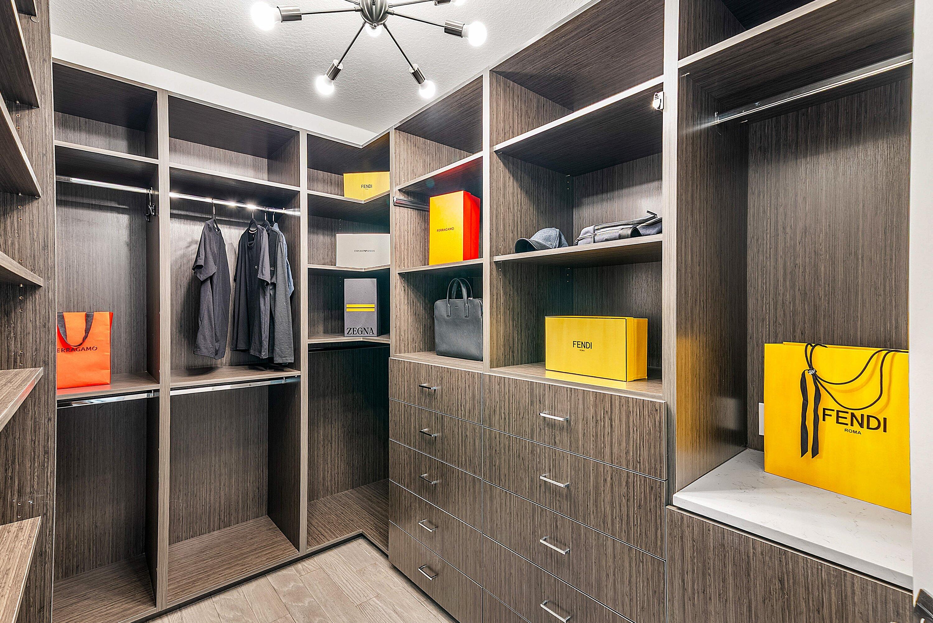 9065 Benedetta Place Boca Raton, FL 33496 - Photo 23 of 51 a view of walk in closet