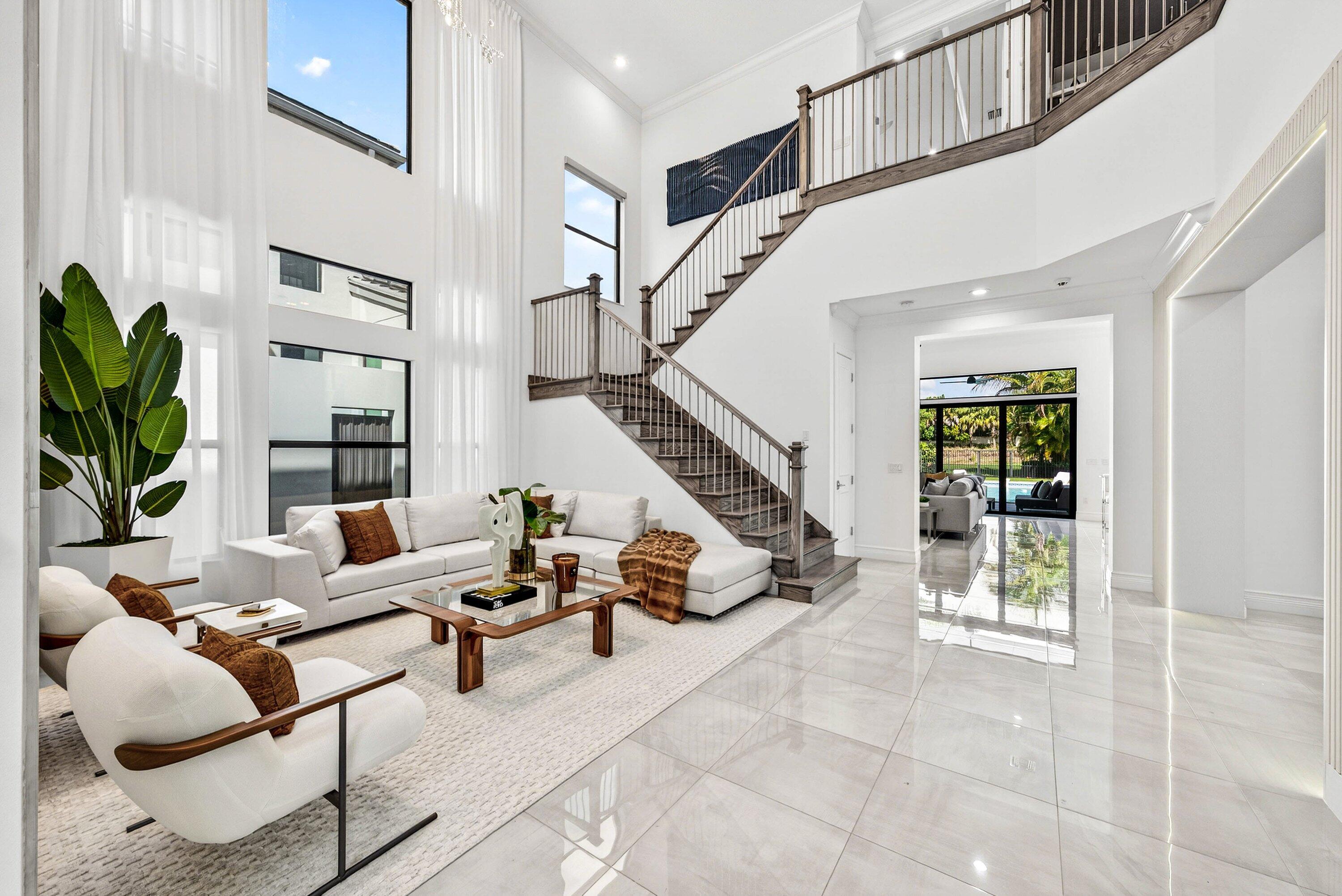 9065 Benedetta Place Boca Raton, FL 33496 - Photo 3 of 51 a living room with furniture