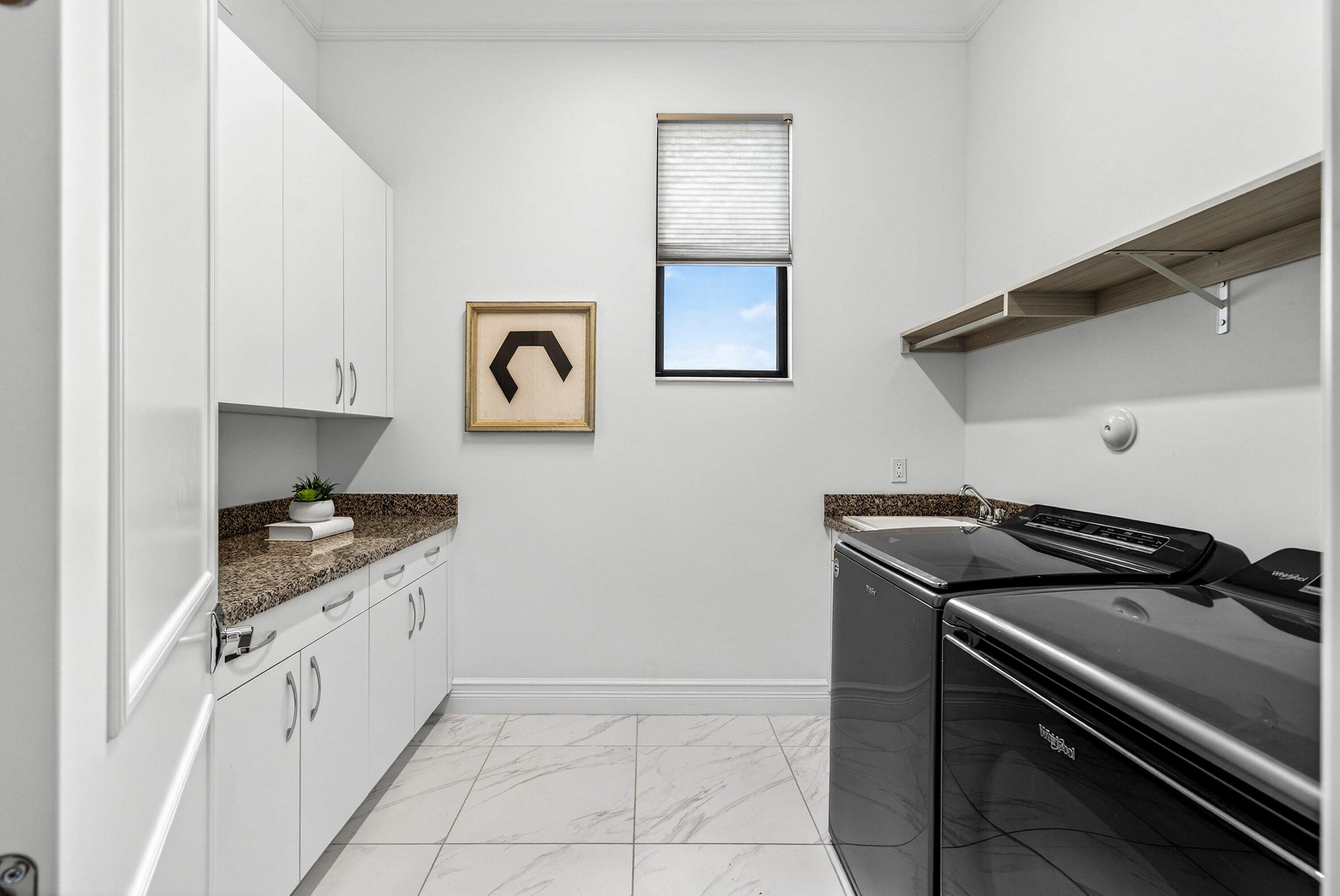 9065 Benedetta Place Boca Raton, FL 33496 - Photo 33 of 52 a kitchen with granite countertop a stove and a sink