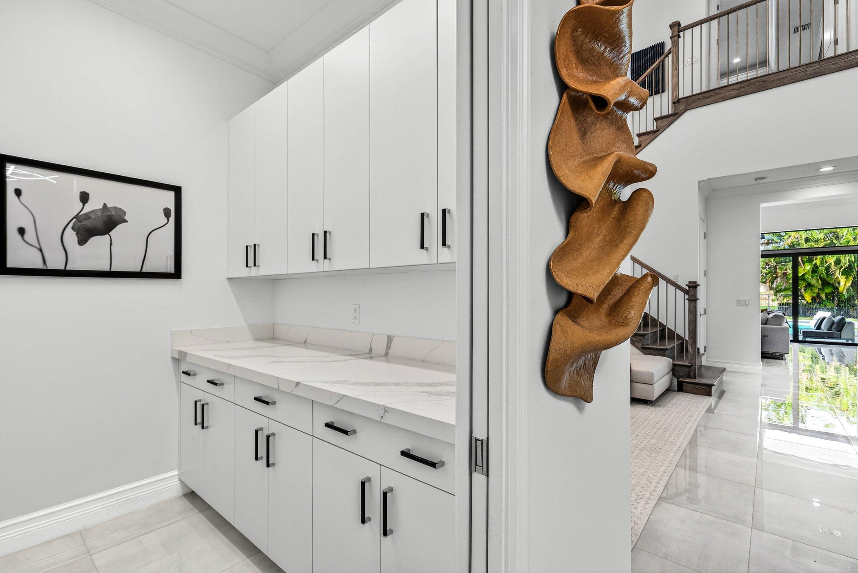 9065 Benedetta Place Boca Raton, FL 33496 - Photo 34 of 51 a bathroom with a sink and mirror