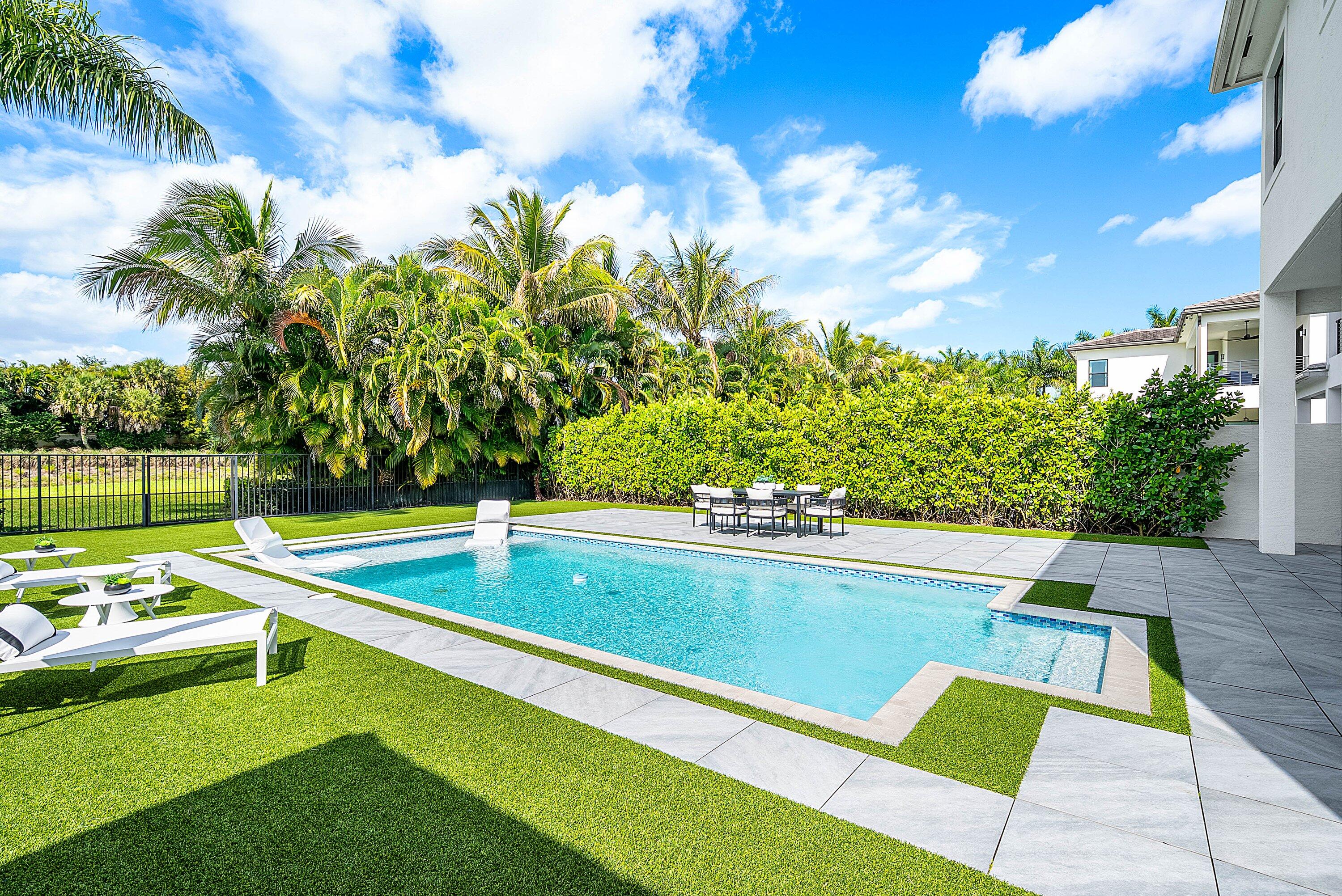 9065 Benedetta Place Boca Raton, FL 33496 - Photo 36 of 52 a view of an outdoor space with swimming pool