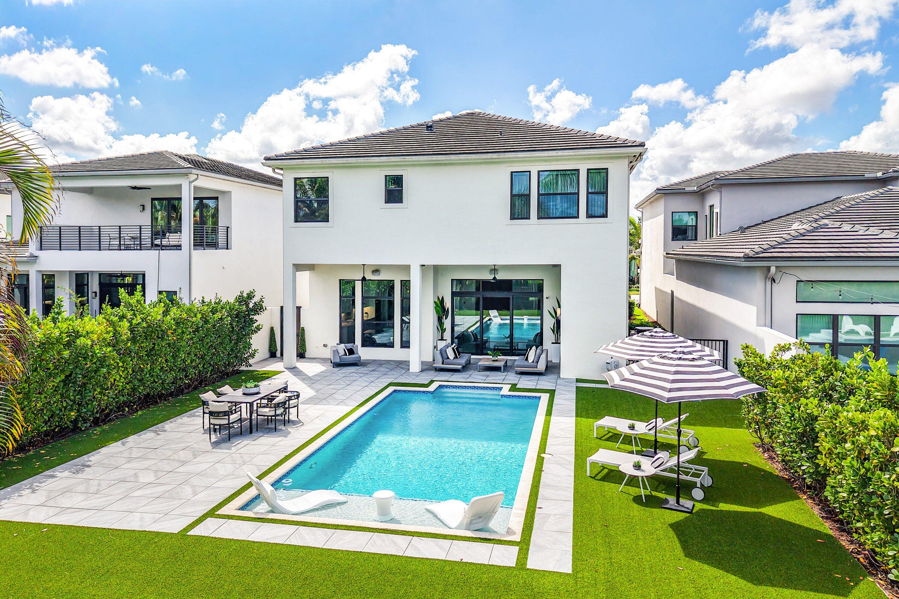 9065 Benedetta Place Boca Raton, FL 33496 - Photo 39 of 51 a view of house that has a patio