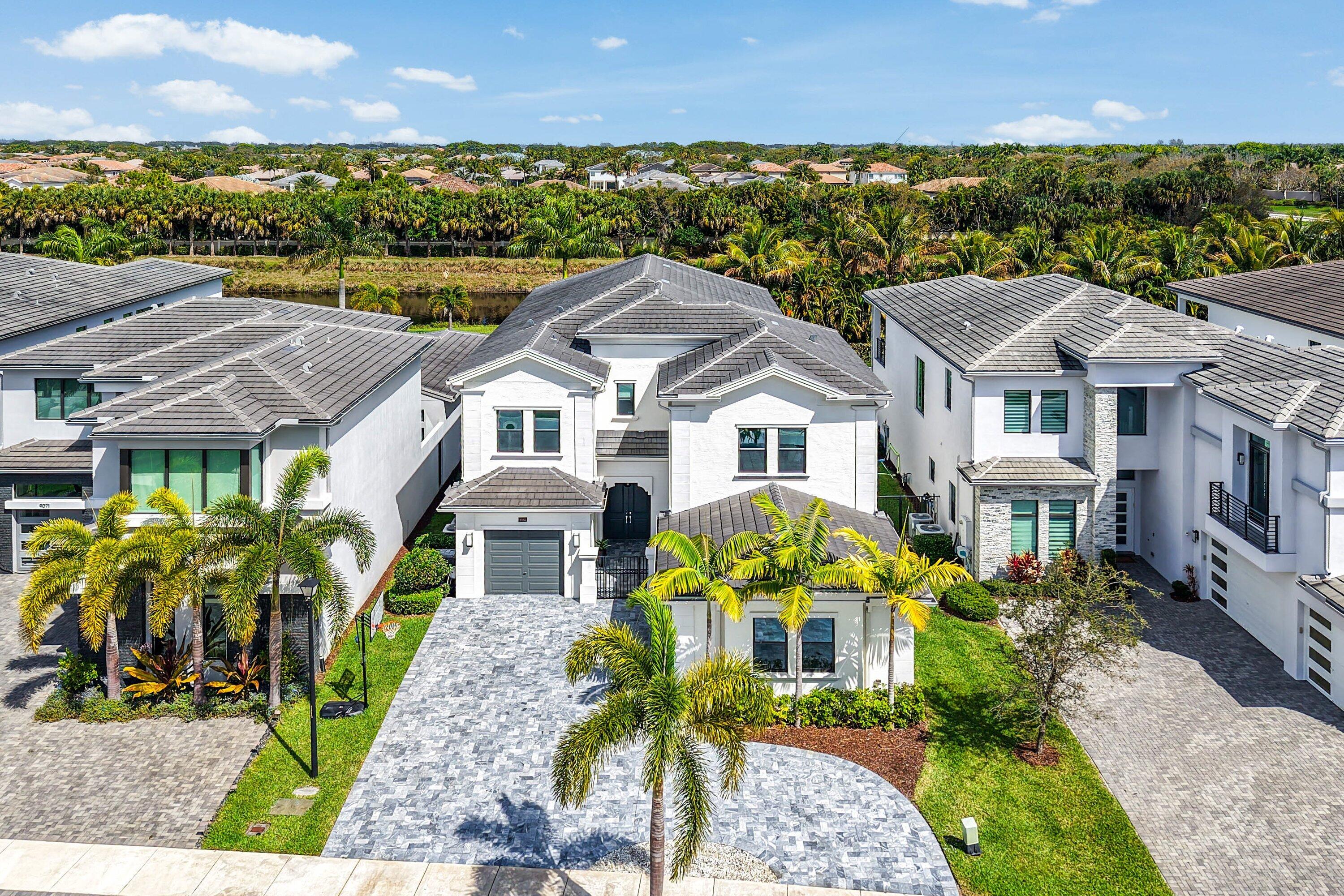 9065 Benedetta Place Boca Raton, FL 33496 - Photo 41 of 52 a view of a city with tall buildings