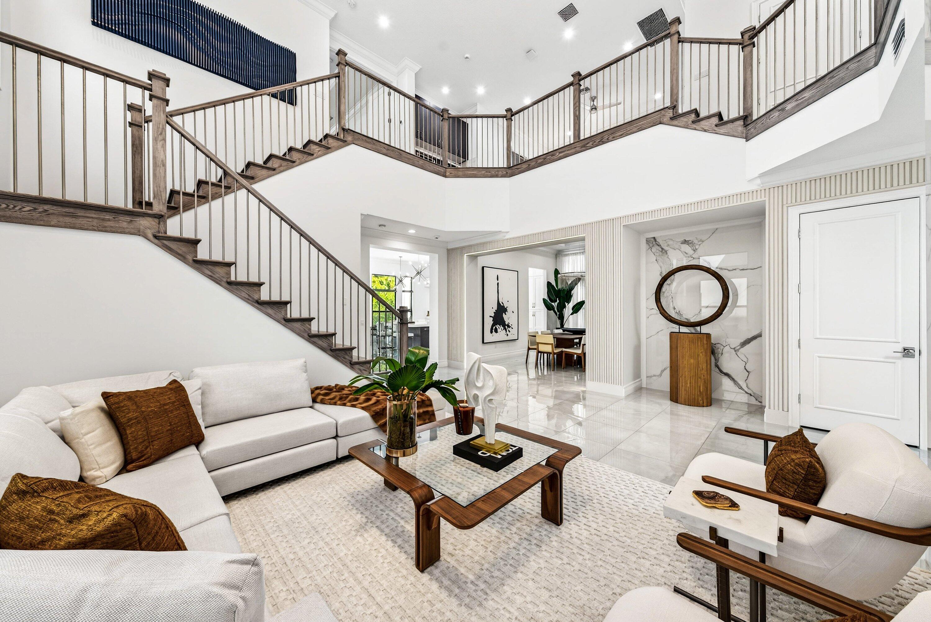9065 Benedetta Place Boca Raton, FL 33496 - Photo 5 of 51 a living room with furniture potted plant and a ceiling fan