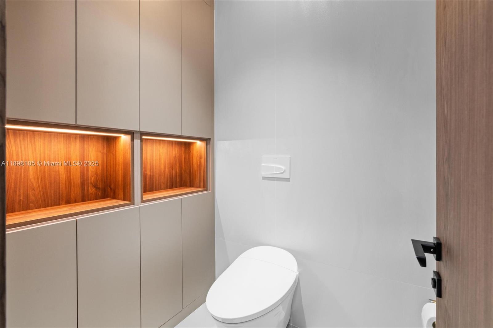 7755 Southwest 85th Court Miami, FL 33143 - Photo 29 of 70 a bathroom with a toilet