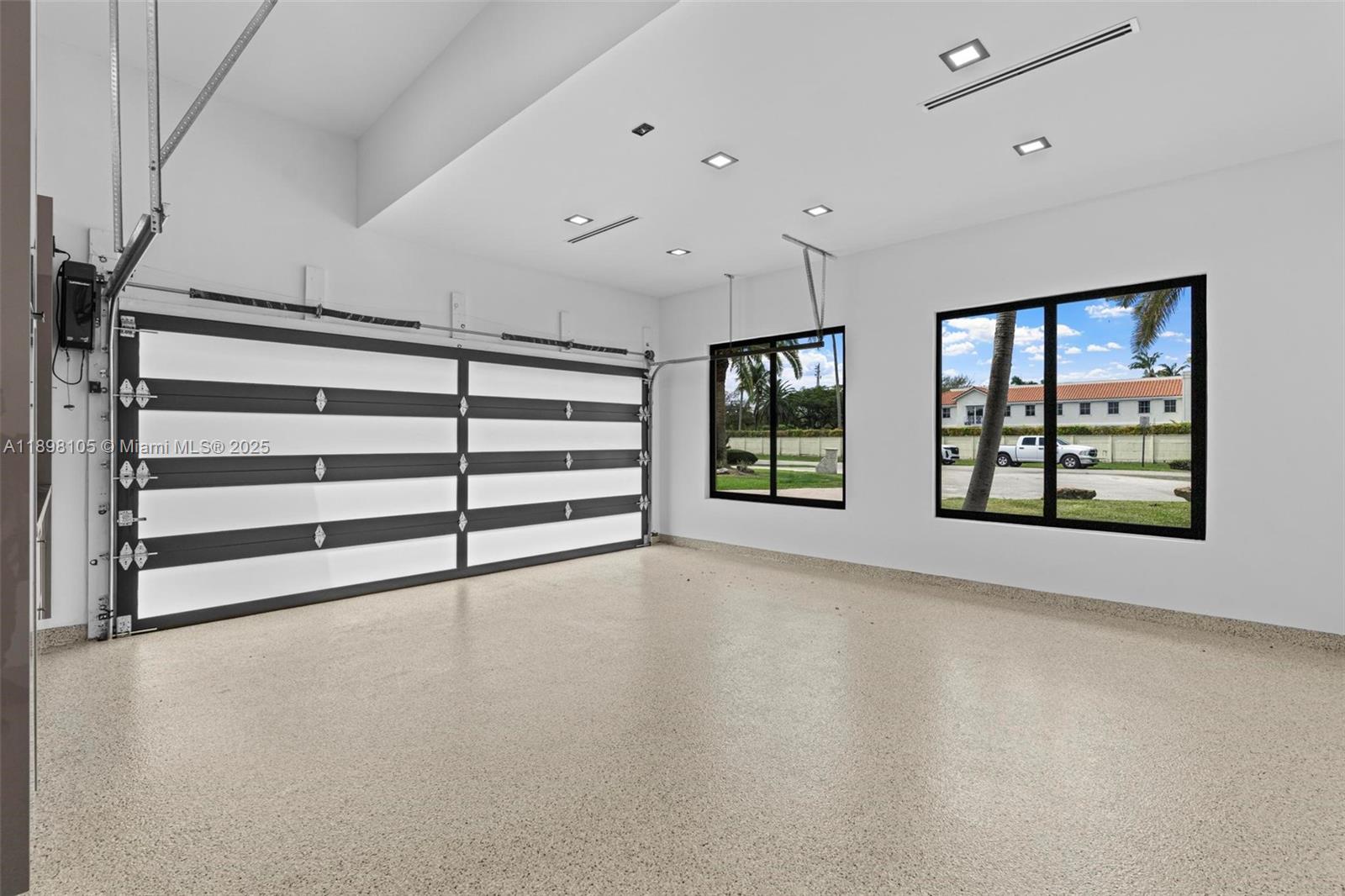 7755 Southwest 85th Court Miami, FL 33143 - Photo 45 of 70 a view of an empty room with a window