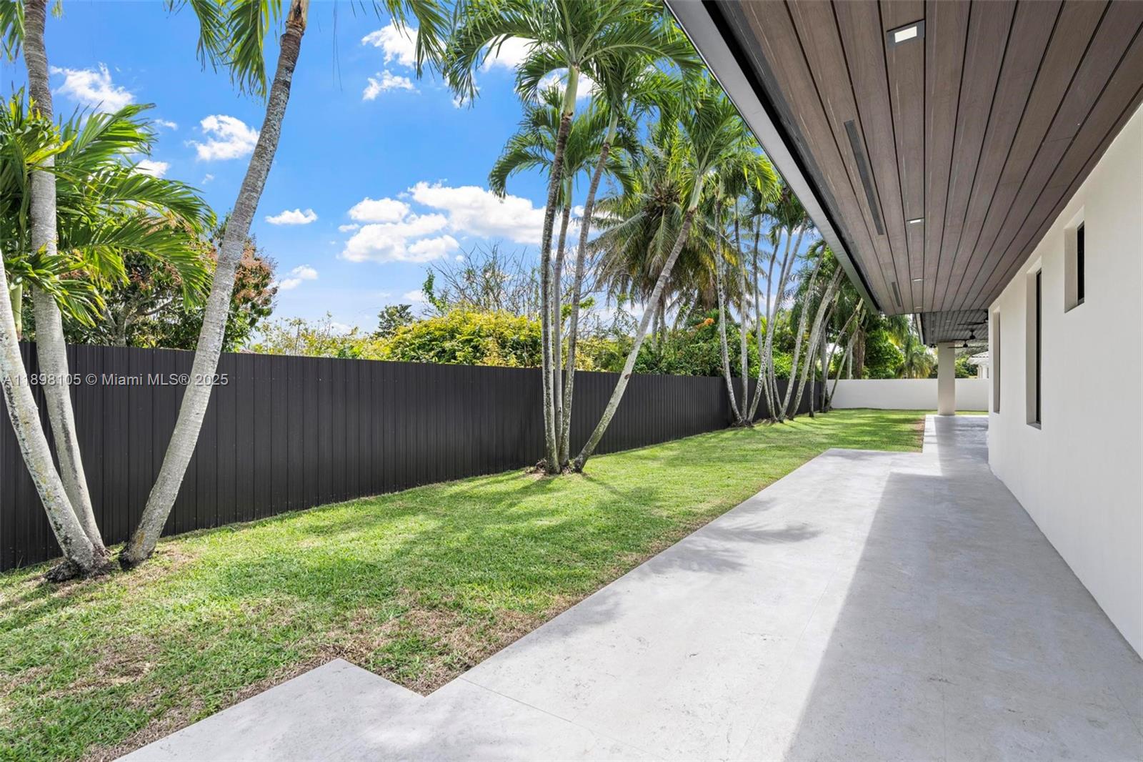 7755 Southwest 85th Court Miami, FL 33143 - Photo 52 of 70 a view of backyard with a garden