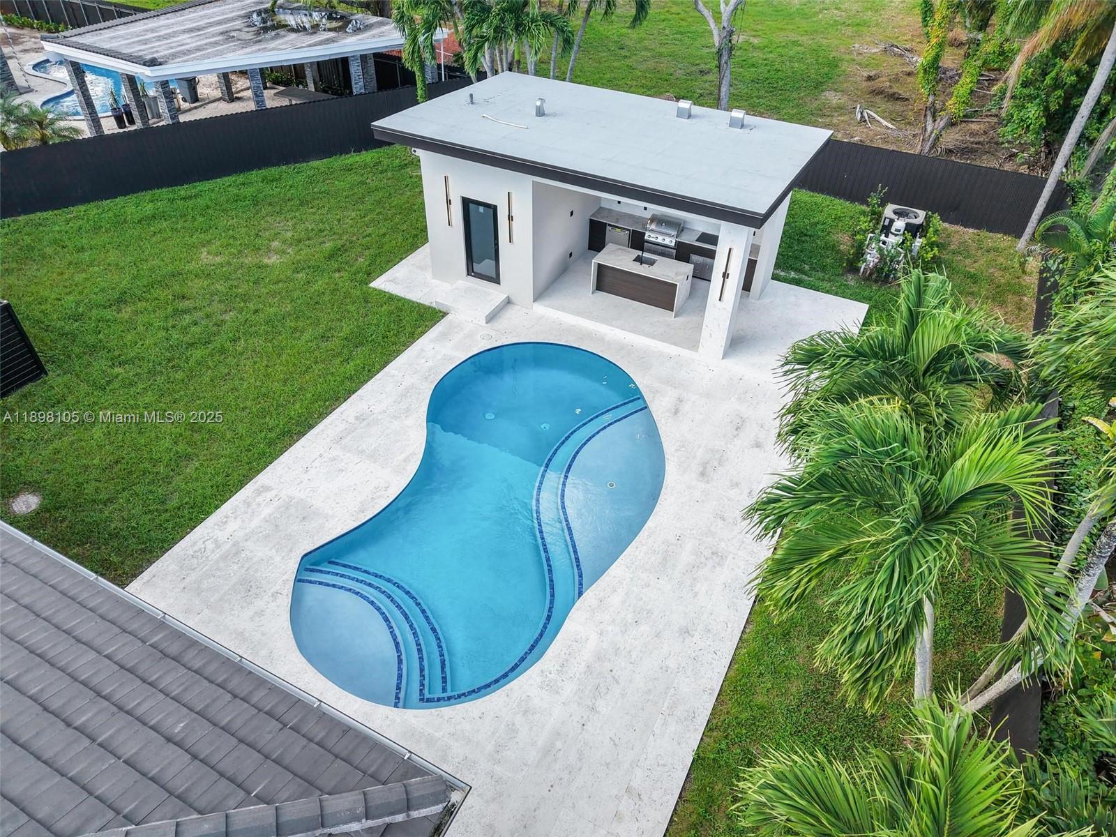 7755 Southwest 85th Court Miami, FL 33143 - Photo 65 of 70 an aerial view of a house with backyard