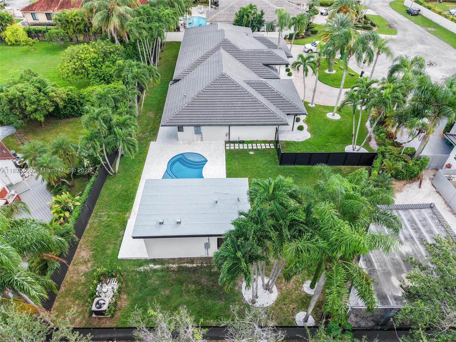 7755 Southwest 85th Court Miami, FL 33143 - Photo 69 of 70 an aerial view of a house with a garden