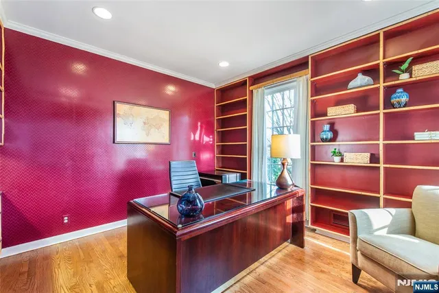 a room with furniture and screen pool