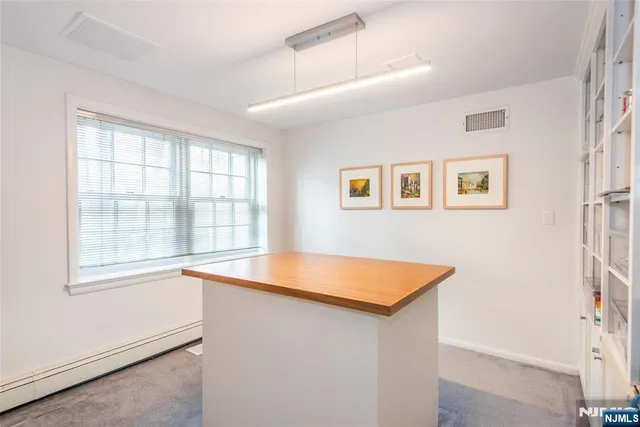 a bed room with bed and a window