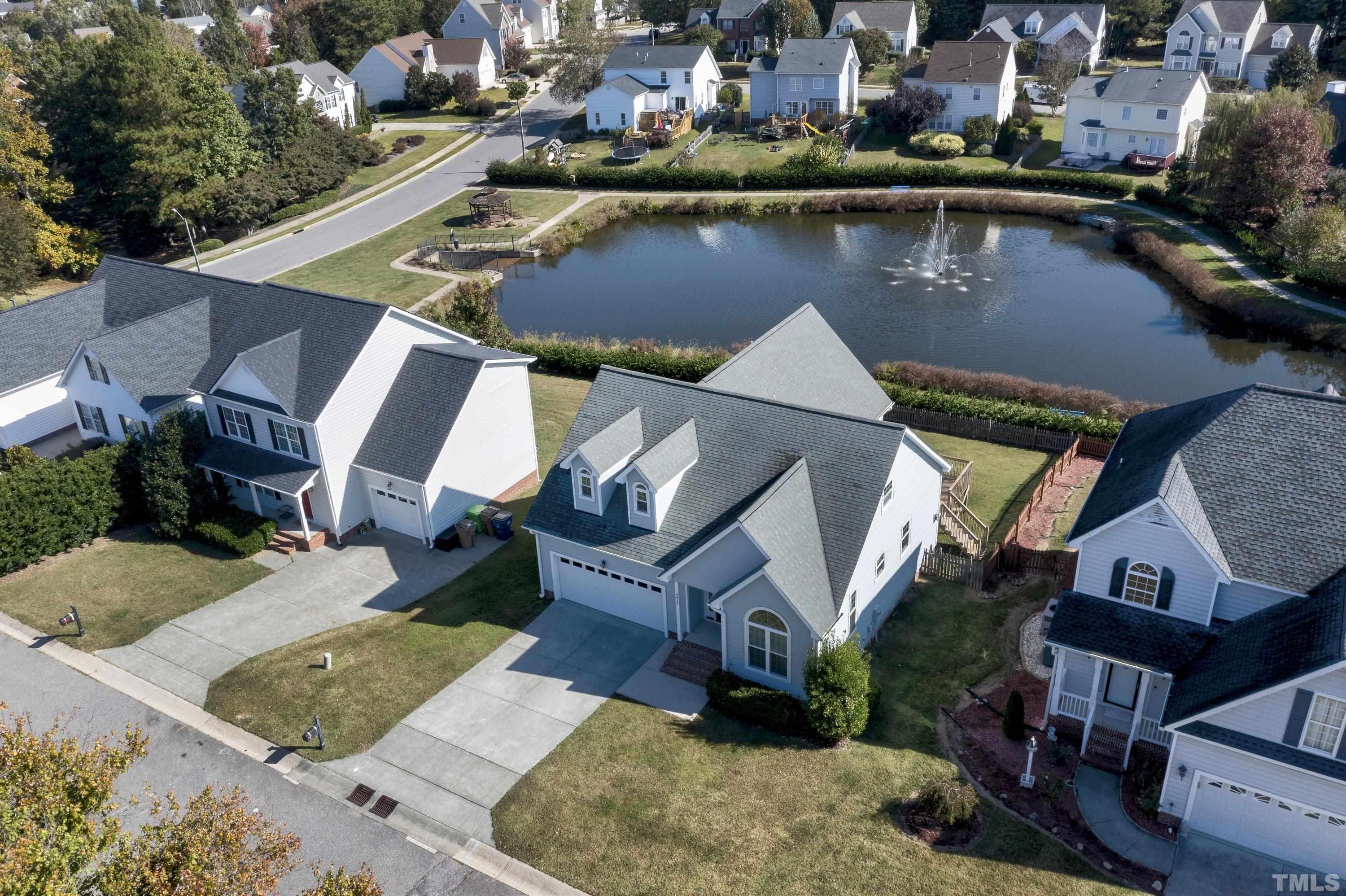 4412 Major Loring Way Raleigh, NC 27616 - Photo 54 of 59 an aerial view of a house with a lake view