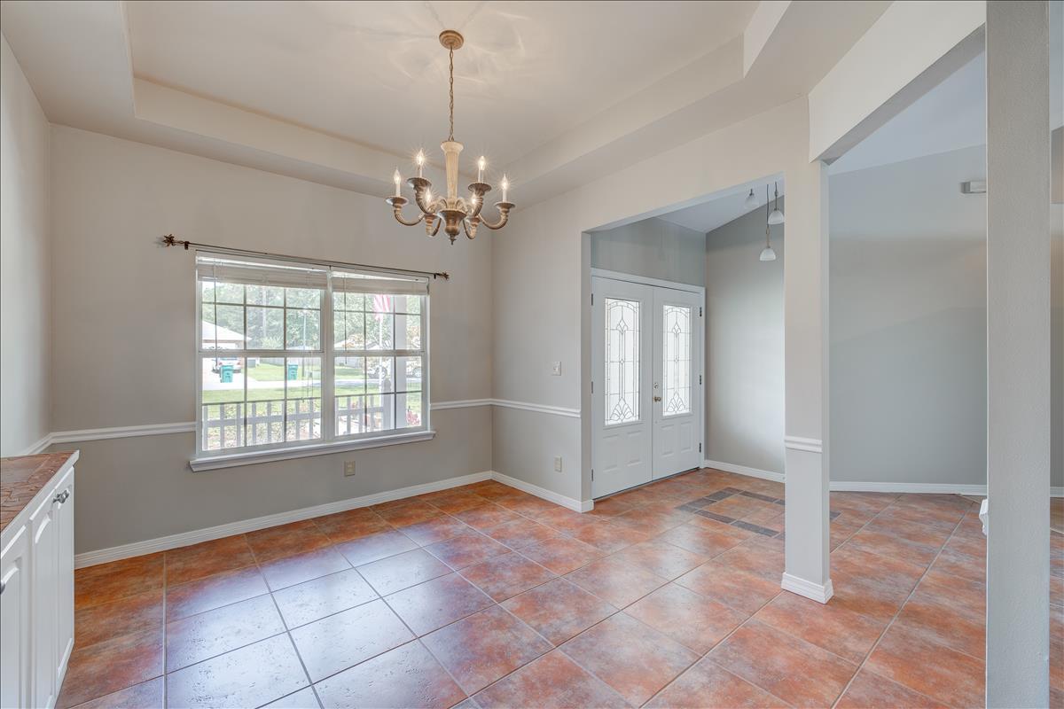 1818 Huntington Road Niceville, FL 32578 - Photo 18 of 53 a view of an empty room with a window