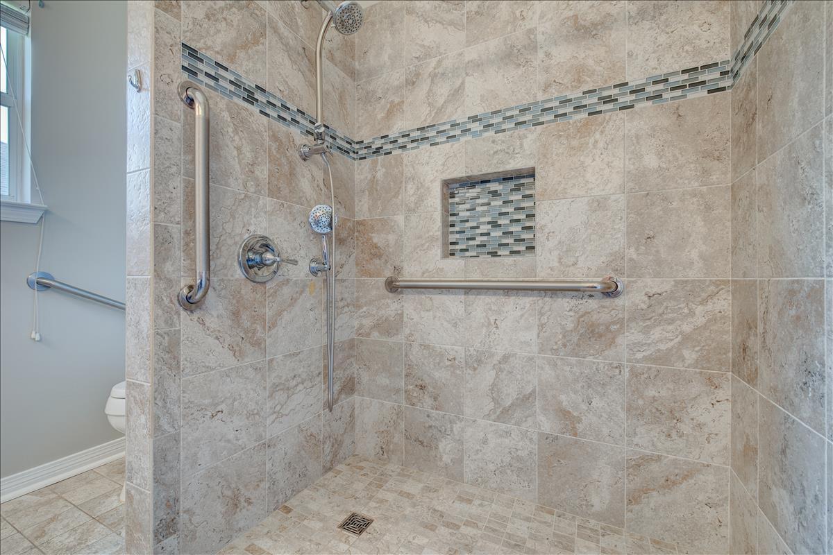 1818 Huntington Road Niceville, FL 32578 - Photo 25 of 53 a bathroom with a shower