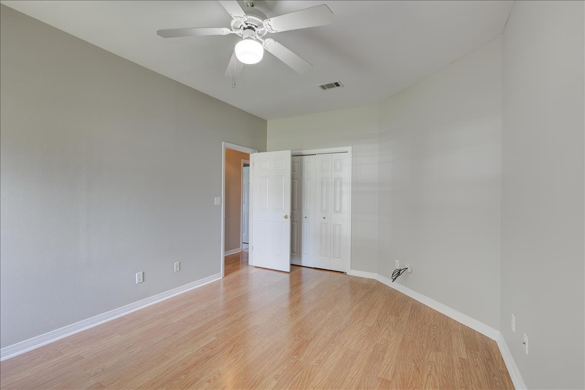 1818 Huntington Road Niceville, FL 32578 - Photo 29 of 53 wooden floor in an empty room