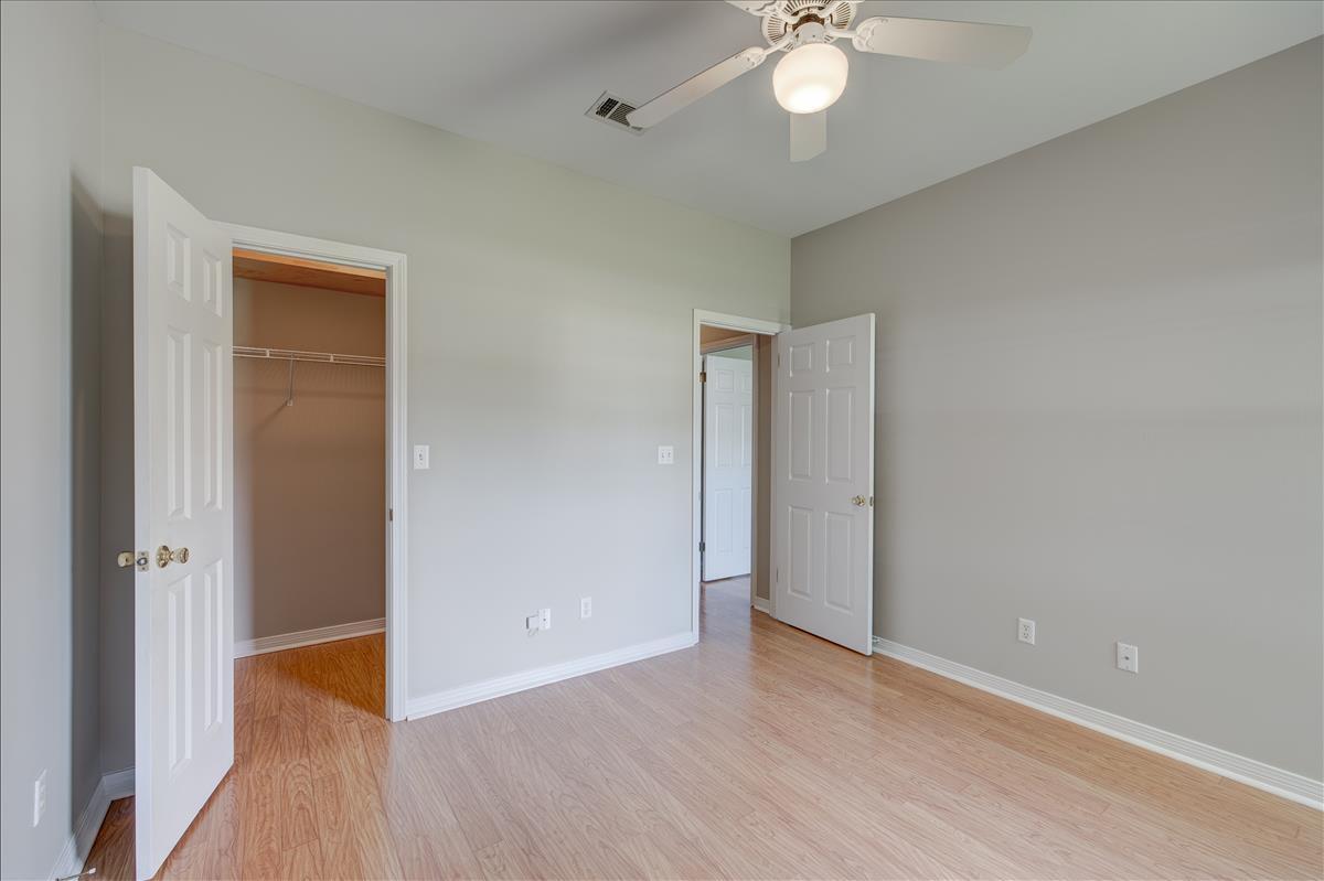 1818 Huntington Road Niceville, FL 32578 - Photo 30 of 53 a view of an empty room with wooden floor