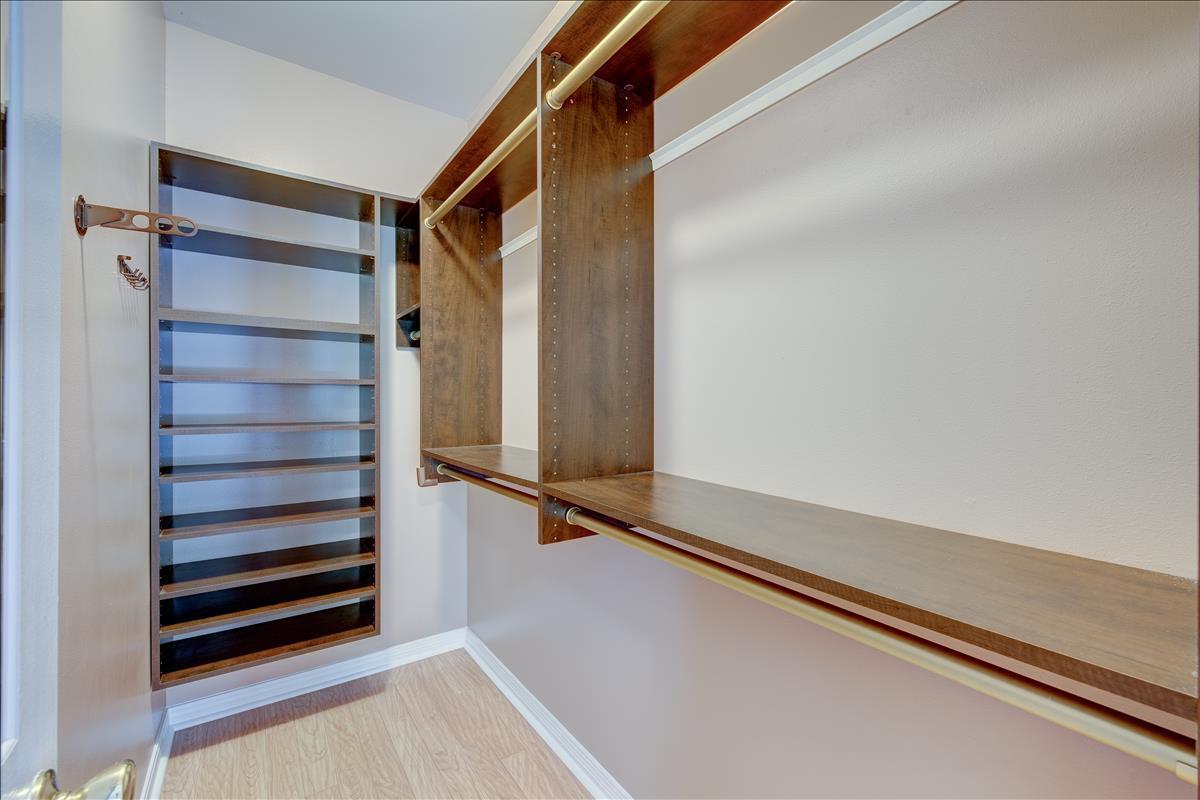 1818 Huntington Road Niceville, FL 32578 - Photo 38 of 53 a view of walk in closet with empty racks