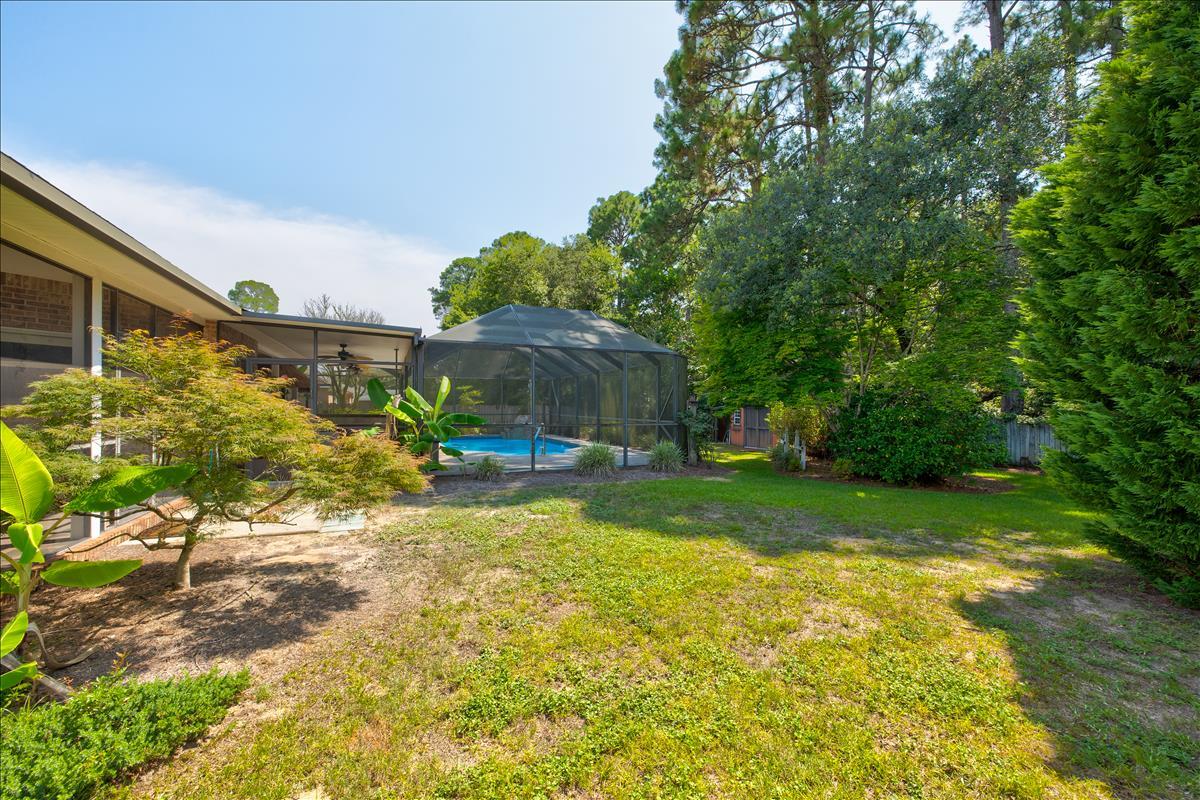 1818 Huntington Road Niceville, FL 32578 - Photo 50 of 53 a view of a house with a yard