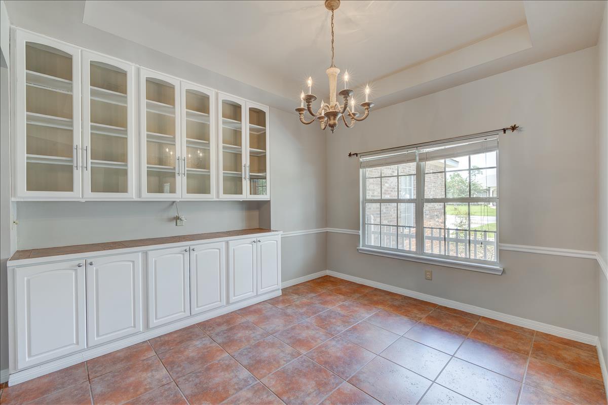 1818 Huntington Road Niceville, FL 32578 - Photo 6 of 53 a view of an empty room with a window