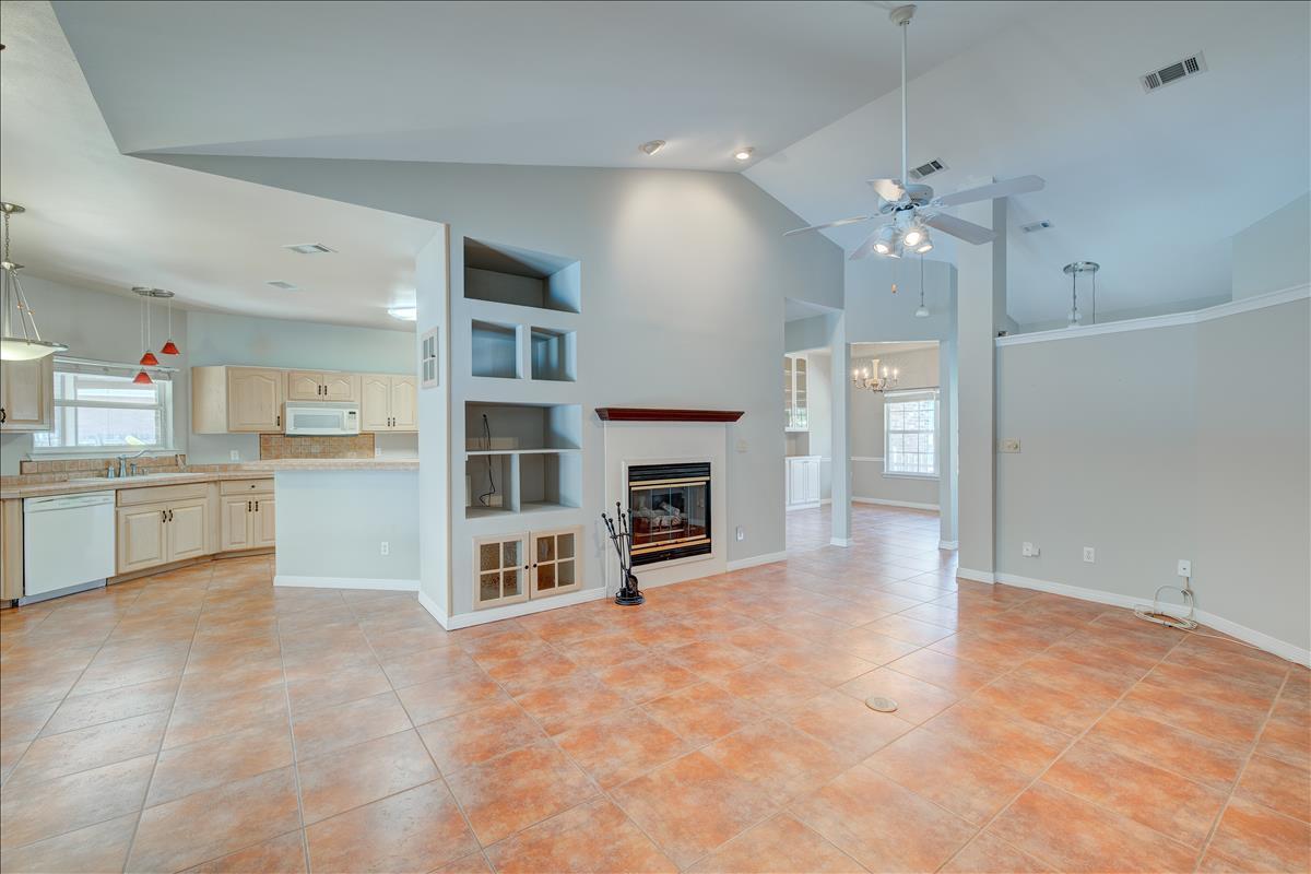1818 Huntington Road Niceville, FL 32578 - Photo 10 of 53 a view of a kitchen with furniture and a fireplace