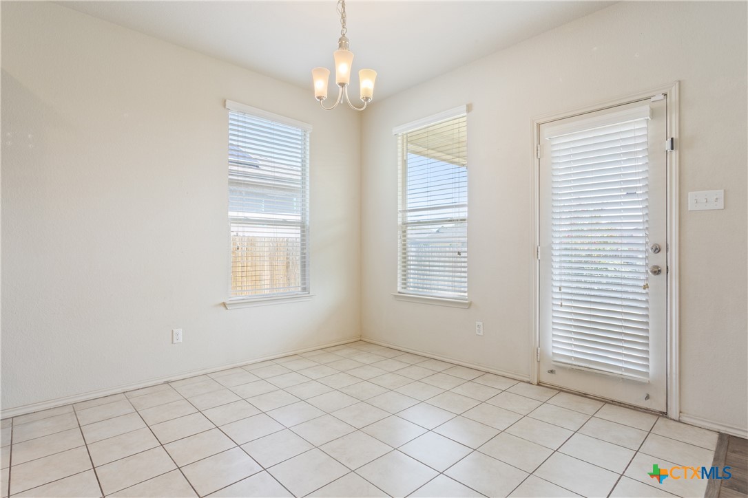 231 Druse Lane Jarrell, TX 76537 - Photo 12 of 38 a view of an empty room with a window