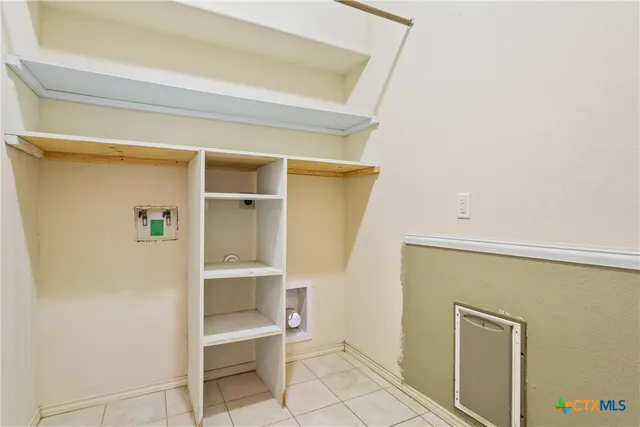 a view of an empty walk in closet