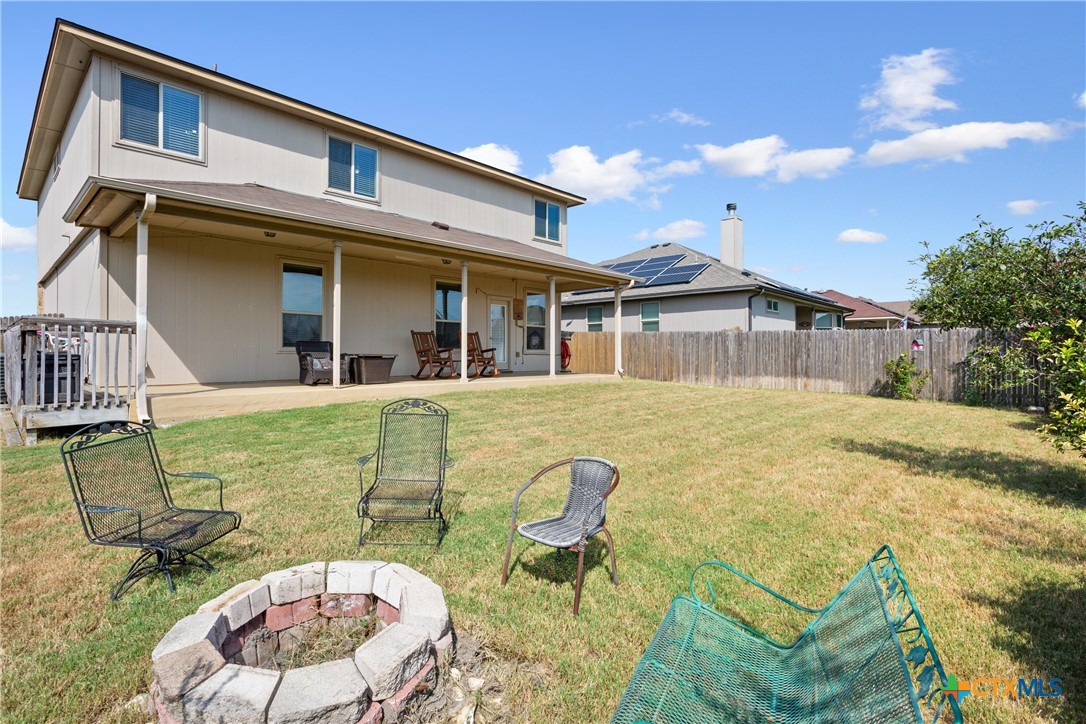 231 Druse Lane Jarrell, TX 76537 - Photo 33 of 38 front view of a house with a swimming pool
