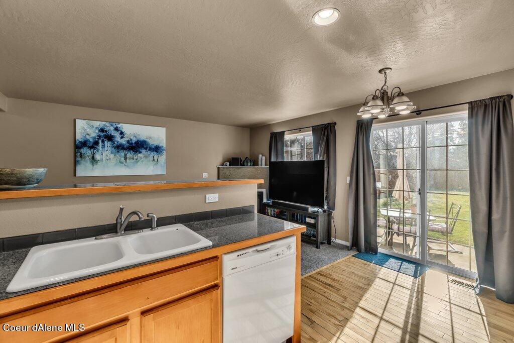 109 West 19th Avenue, Unit A Post Falls, ID 83854 - Photo 11 of 22 Kitchen with view of back yard