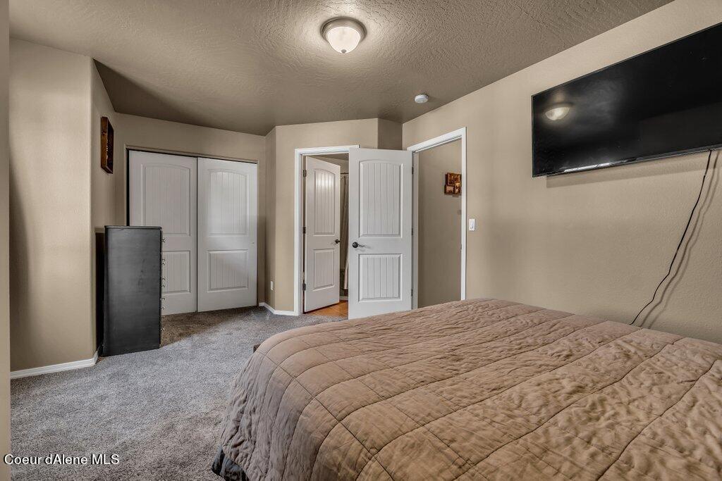 109 West 19th Avenue, Unit A Post Falls, ID 83854 - Photo 14 of 22 Master Bedroom En-suite