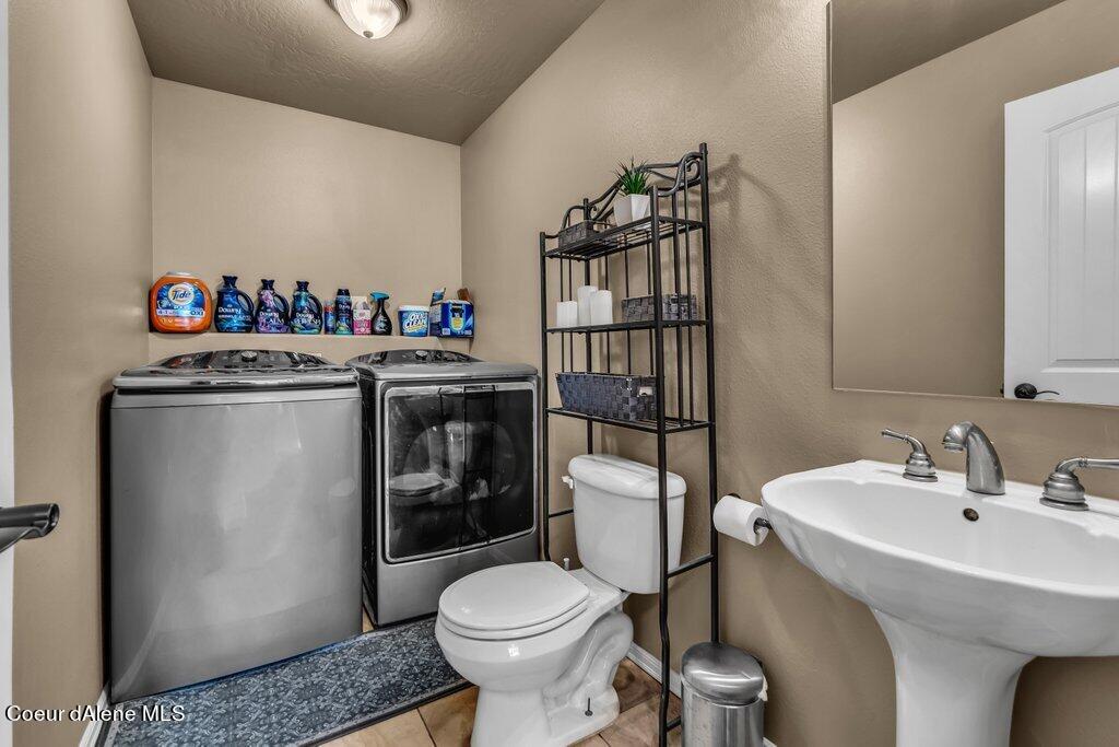 109 West 19th Avenue, Unit A Post Falls, ID 83854 - Photo 19 of 22 Laundry and Half Bathroom