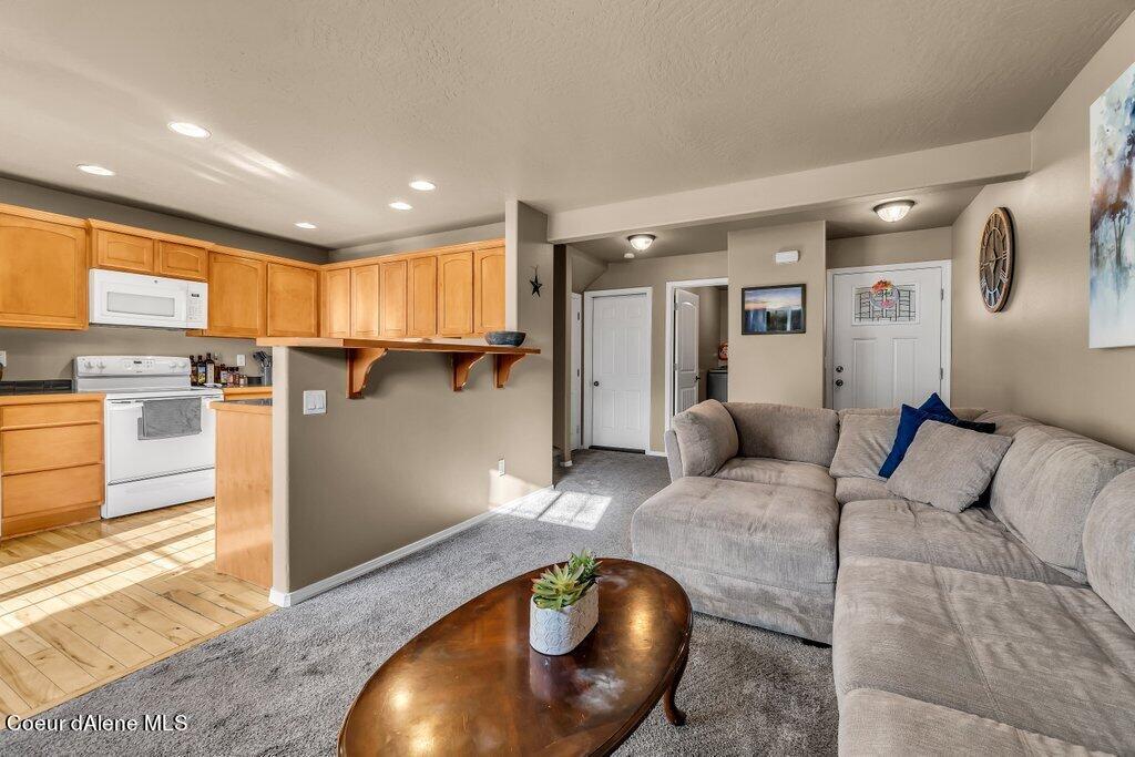 109 West 19th Avenue, Unit A Post Falls, ID 83854 - Photo 6 of 22 Living/Kitchen