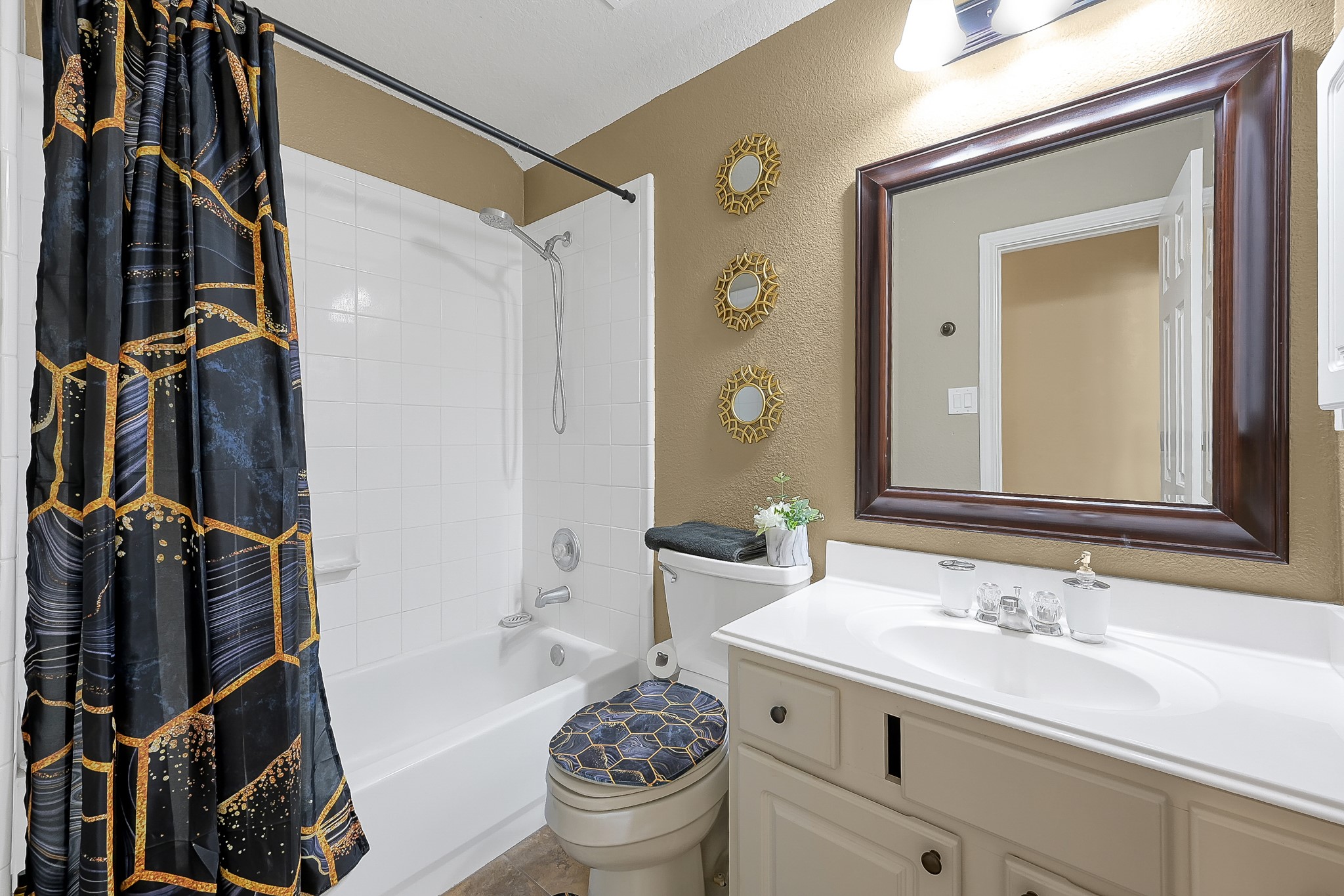 180 Park Way Conroe, TX 77356 - Photo 19 of 23 a bathroom with a sink toilet and shower