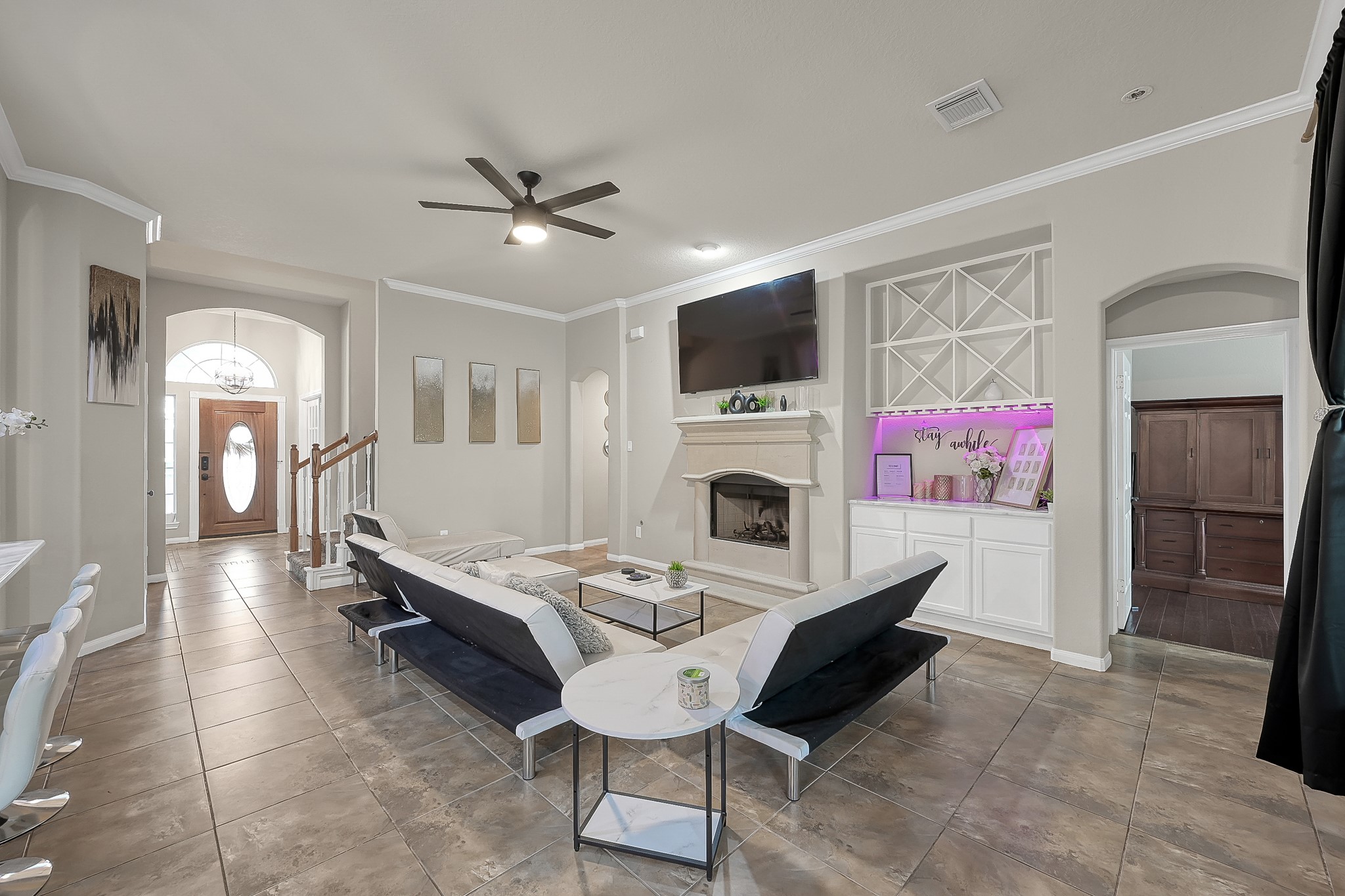 180 Park Way Conroe, TX 77356 - Photo 8 of 23 a living room with furniture and a fireplace