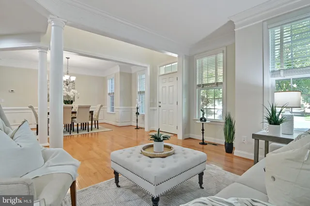 a kitchen with stainless steel appliances granite countertop wooden cabinets sink and stove